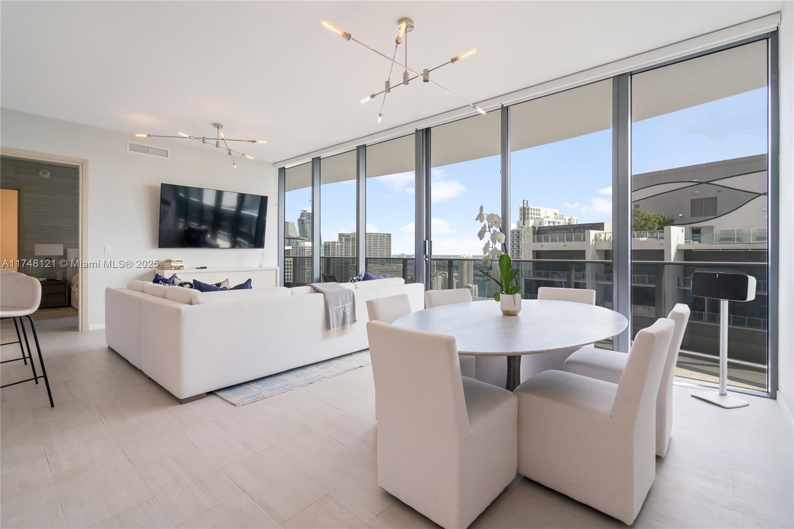 Experience luxury living at Brickell Flatiron with this designer decorated 2 bedrooms, 2-and-a-half-bathroom unit. Furnished with Restoration Hardware furniture, this property boasts stunning city and water views. Perfect for those looking for a sophisticated and modern living space. The amenities at Brickell Flatiron are some of the bests in the city. Among them are a rooftop pool located on the 64th-floor offering 360-degree, unobstructed water and city views; spa and fitness center with private steam, sauna; an 18th-floor lap pool; a children’s playroom and pool; a full-time doorman and concierge; movie theater; wine room and cellar; and social lounge.