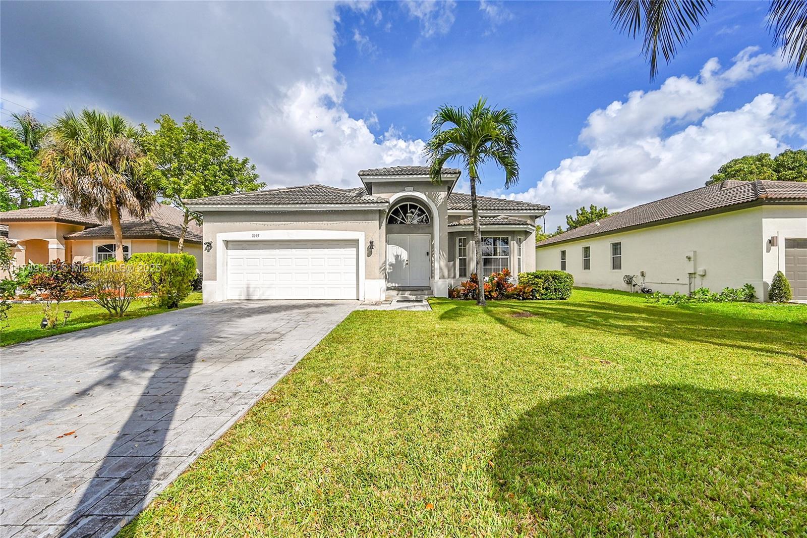 7095 E Tropical Way, Plantation, Florida image 1