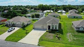 1957 SW Logan St, Port St. Lucie, Florida image 1