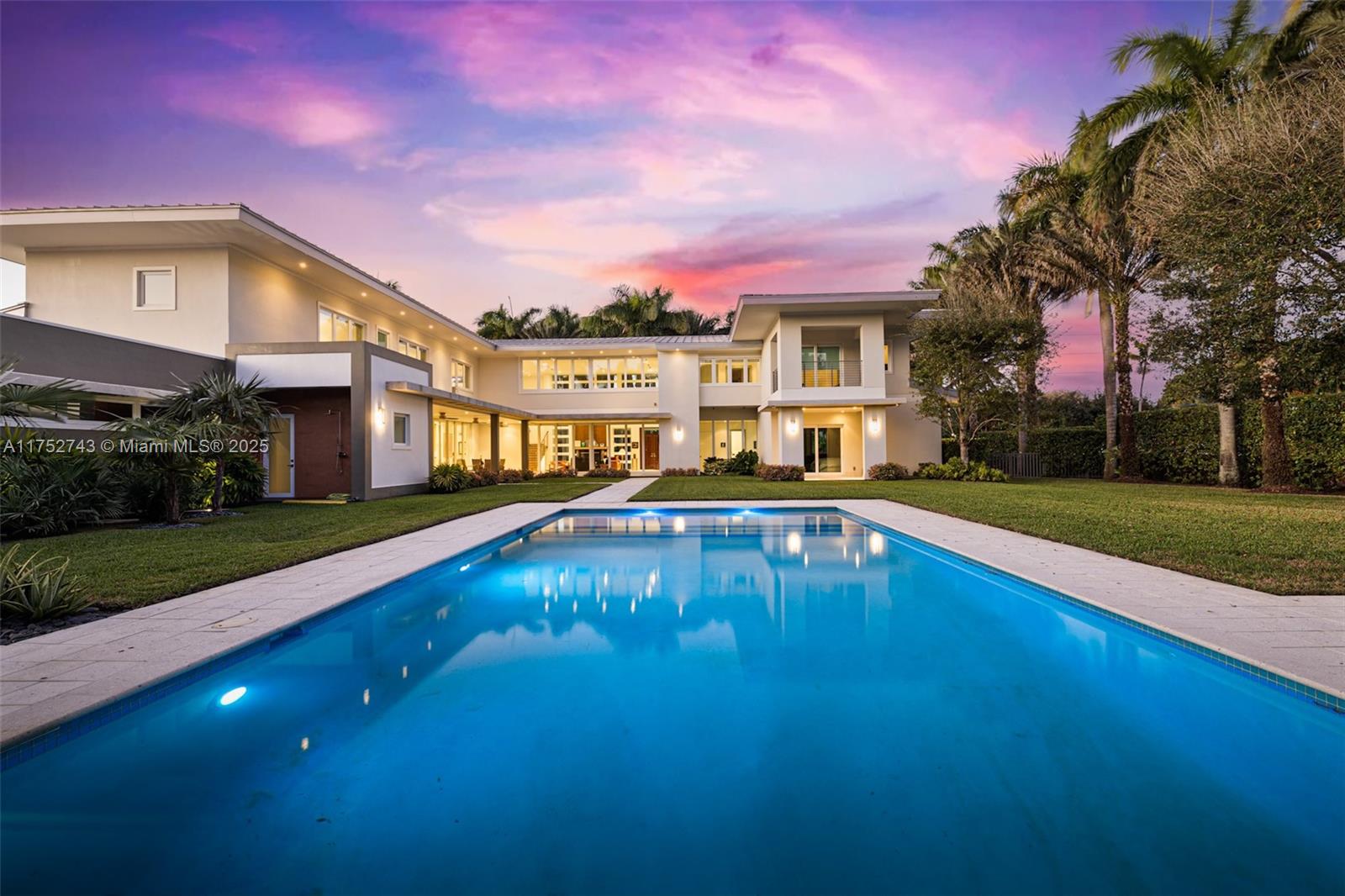 Sited on just under 1 acre in the prestigious NE section of Pinecrest, this exquisite custom estate embodies a modern style while embracing form and function.Dramatic floor to ceiling windows flood the interior of the home with an abundance of natural light and a thoughtful open floor plan offers a variety of spaces that can be curated to fit any aesthetic.The bespoke kitchen with Viking and Sub-Zero appliances is sure to inspire.With 3 bedrooms downstairs, the primary and 2 additional bedrooms upstairs, all ensuite, and an elevator, this home can complement any living situation. The breezy patios and detached loggia are perfect places to relax or entertain family and friends. Integrated Creston smart home system, whole house generator and 3 car garage complete this extraordinary property.