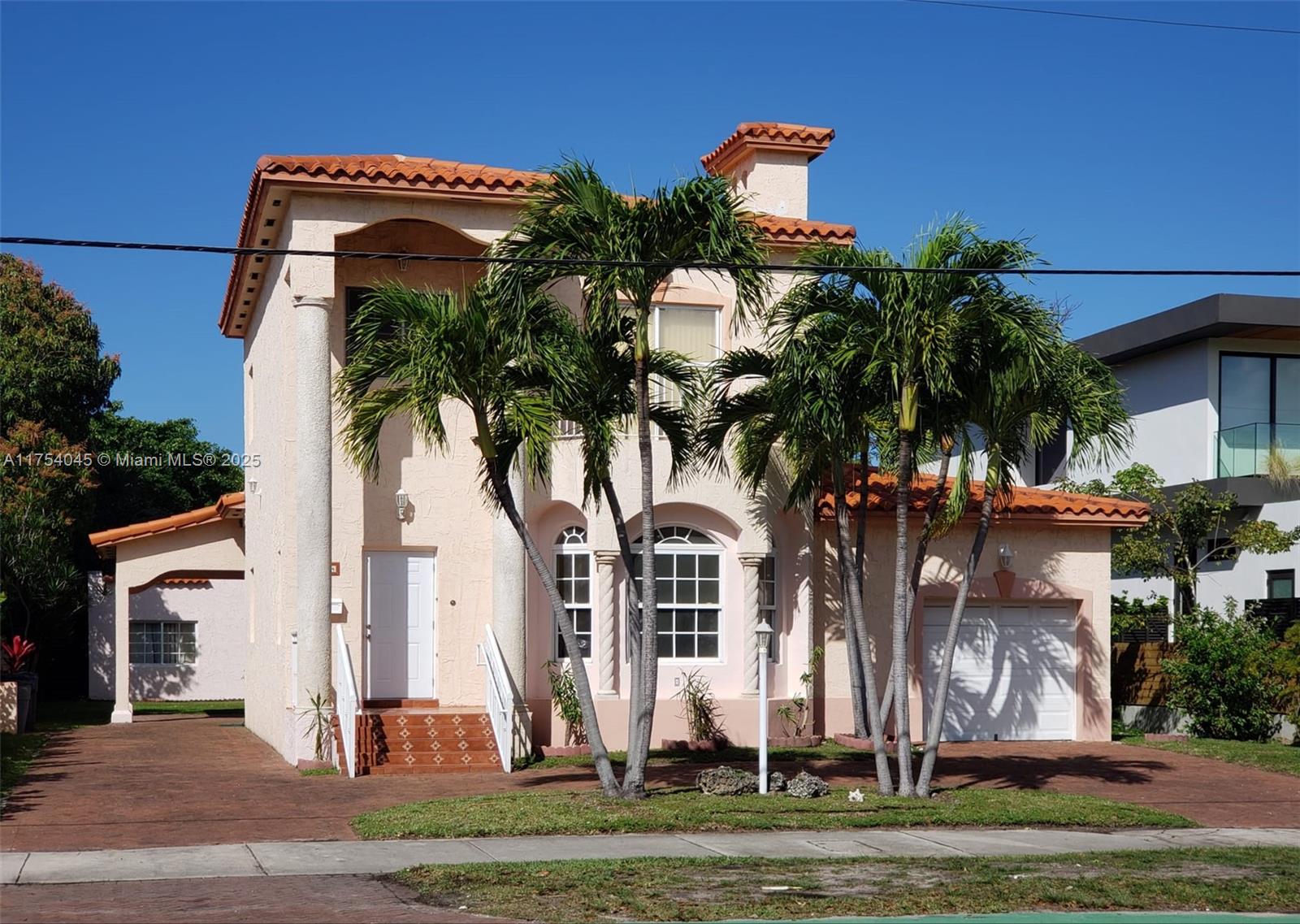 Imagine your dream home overlooking the lush greenery of the Miami Beach Golf Course, where stunning western exposure provides breathtaking sunset views. A Classic Residence rebuilt in 1999 with 11-foot ceilings, reinforced concrete foundation & walls, new plumbing and electrical & updated elevation codes. Ample driveways, up-to 8 cars, offering opportunity to move in or modernize by renovation. A separate guest cottage enhances the property's versatility. Potential to increase S.F. or create a custom masterpiece in this sought-after location. Near 41st Street District, Linc. Rd mall/South Beach, 5 blocks from the Beach’s sand. Close to houses of worship. Walk to new Bayshore Park, a 19.4-acre oasis, w/a lake, tennis/pickleball, dog park/fitness center/kids playground. A Rare opportunity!