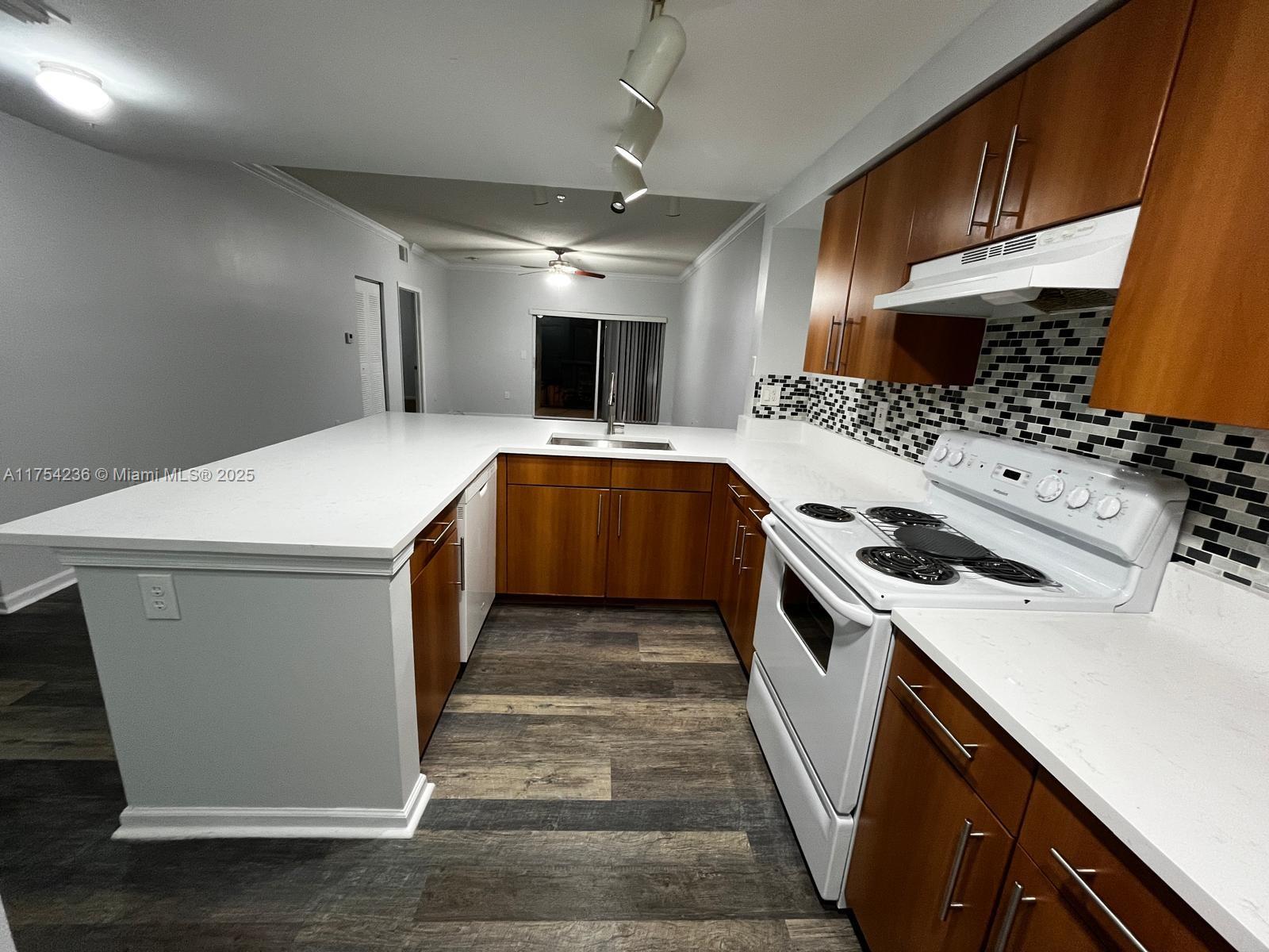5900 W Sample Rd #303, Coral Springs, Florida image 2
