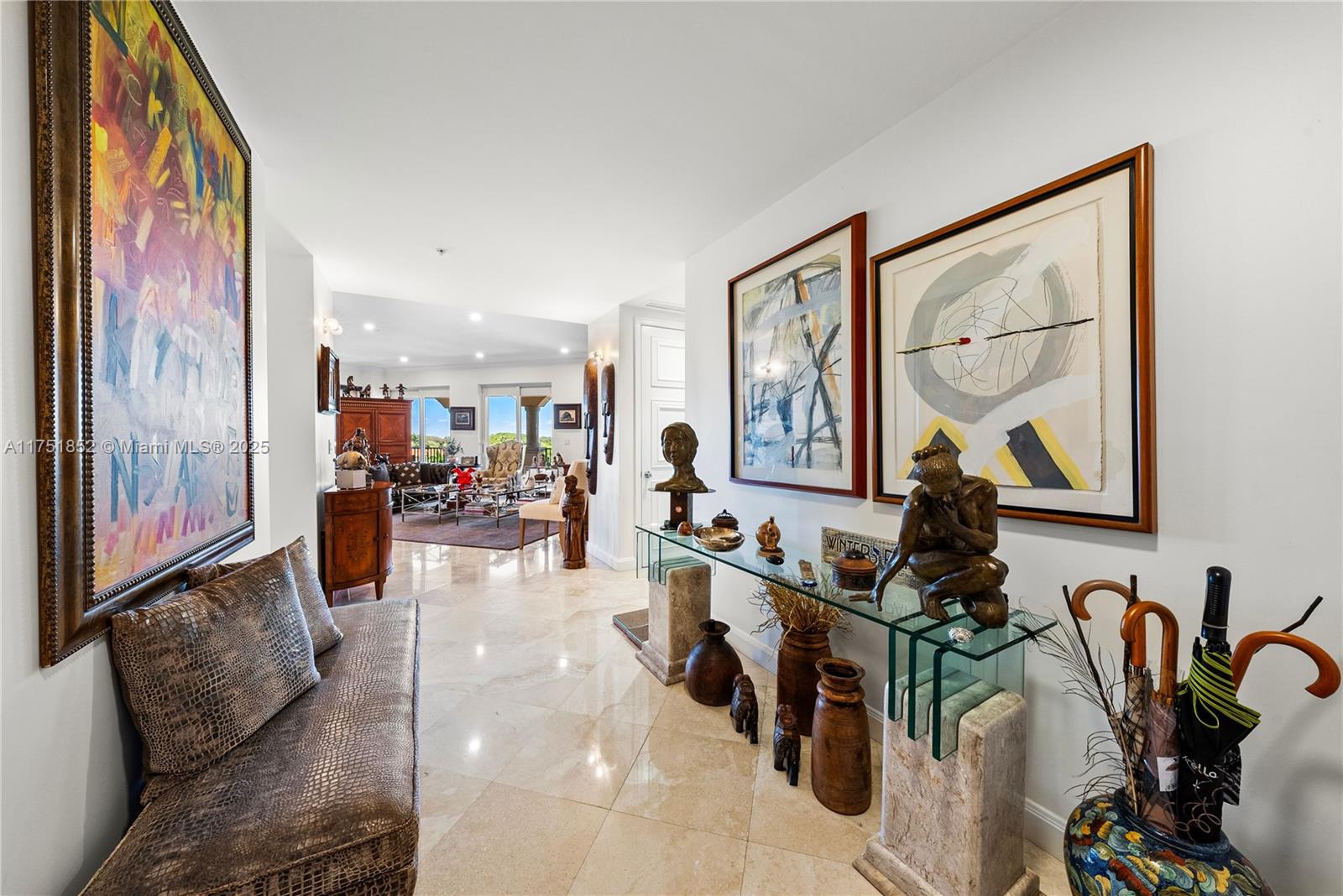 Welcome to Deering Bay Yacht and Country Club’s life style.  This great fifth floor unit in the Padua building features 3 spacious bedrooms with their own bathroom and walk-in closet, half bath, 2 parking spaces next to each other #106-107, ample A/C storage and 1 golf cart parking space #28. The apartment's floors are marble and wood, it has a separate office and lots of storage spaces inside. This unit is surrounded by wide balconies and the best sunset view that you can ever ask for. Walk and admire the serenity of this guard-gated grounds in this community that every resident loves.