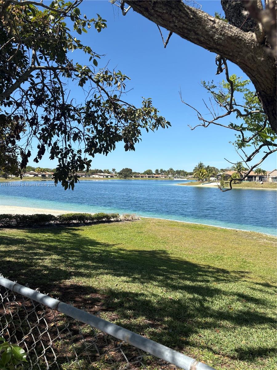 CORNER BEACH AND LAKE FRONT!!! Excellent area at entrance of Devon Aire #4, new hurricane impact doors and windows. Super location cross the street to many restaurants, banks, doctors offices, beauty salons and 1/2 block from turnpike.