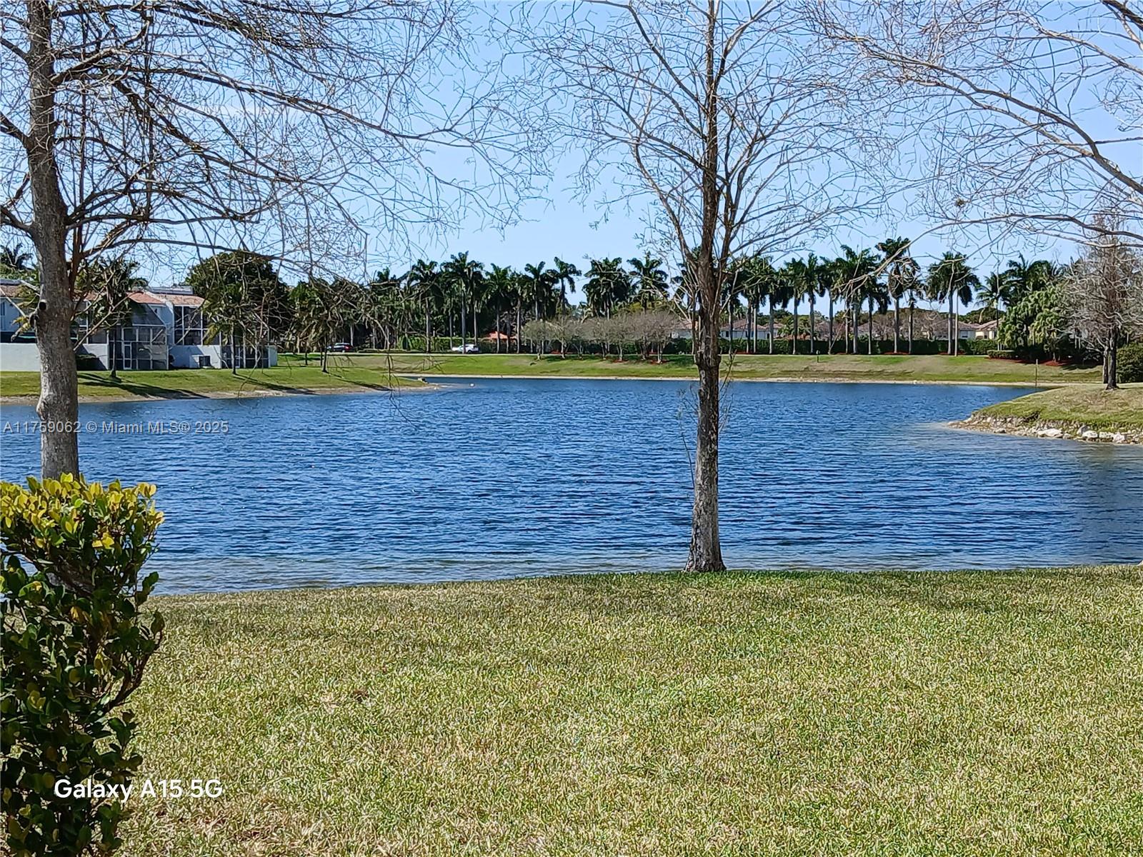 Stunning 3-bedroom, 2.5-bathroom lagoon-front unit in a resort-style community in Doral. Boasting over 2,800 sq ft of spacious living, this home offers breathtaking water views from a private balcony. Enjoy amenities like tennis courts, multiple pools, a fully-equipped gym, and 24/7 security in a gated community. Perfectly located in a peaceful residential area, yet just 15 minutes from City Place Doral and close to hospitals, dining, shopping, and more. A true blend of luxury and convenience!