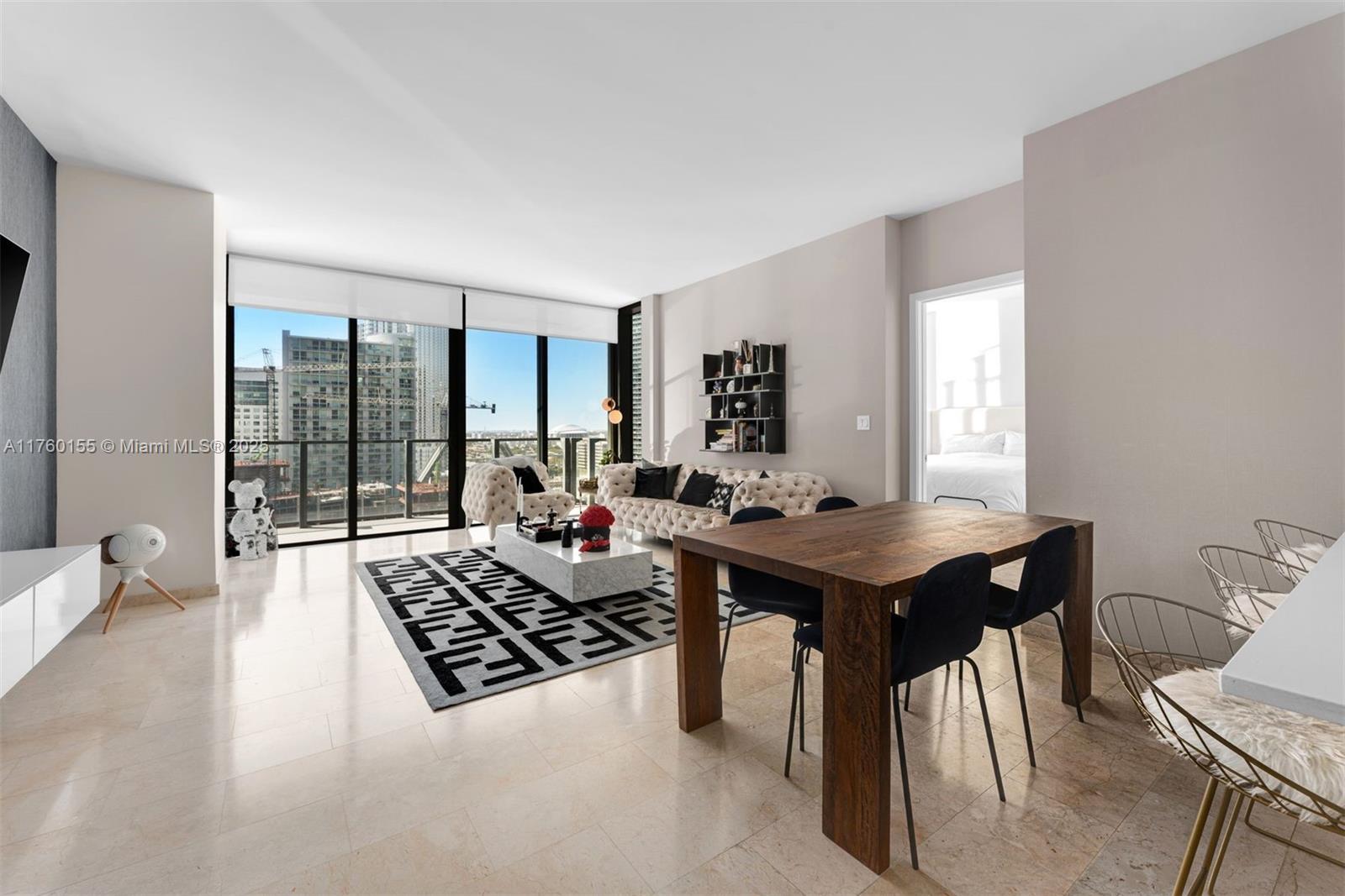 Available immediately! 2 Parking Spaces & Custom Built Ins in each room for additional storage. A breathtaking 3-bedroom + den residence. With a spacious design, this home offers stunning views of Brickell City Centre and the river, seamlessly combining modern luxury with urban convenience. Step onto the expansive balcony, the perfect setting for soaking in spectacular sunsets and entertaining guests. Inside, the residence is impeccably designed, featuring luxurious Italkraft cabinetry, sleek stone countertops in the kitchen and bathrooms, and premium Bosch appliances.  Located in Reach at Brickell City Centre, this exceptional residence offers resort-style amenities and is just an elevator ride away from Miami’s premier shopping and entertainment. A rare opportunity, priced below comps.