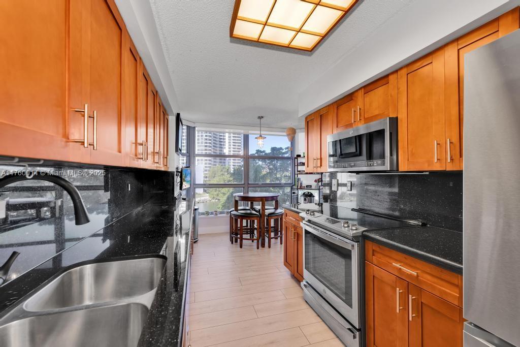 3530 Mystic Pointe Dr #406, Aventura FL 33180
