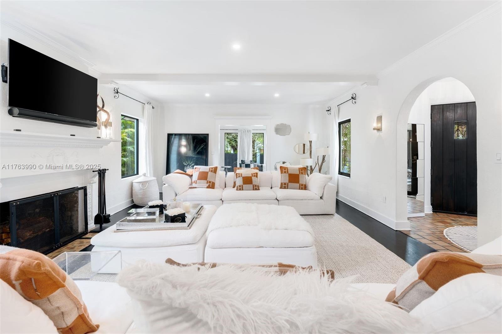 Experience luxury living in this exquisitely remodeled Mediterranean home nestled in the heart of Miami Beach. Boasting 5 beds/5.5 baths, including separate guesthouse w/ full bath, this residence offers unparalleled comfort & sophistication. Indulge your culinary desires in the chef's kitchen, complete w/ LaCornue range & hood combo, double ovens, & SubZero fridge. Enjoy Al Fresco dining or take a dip in the heated saltwater pool w/ spa feature in your backyard oasis. 1st-floor guest room w/ private side entrance ensures privacy for visitors. Unwind in master bath's solid copper soaking tub & dual shower heads. Additional features: dual-zone Nest A/C, alarm system, 2 wood-burning fireplaces, & custom California Closets. This stunning residence captures the essence of old Miami Beach charm
