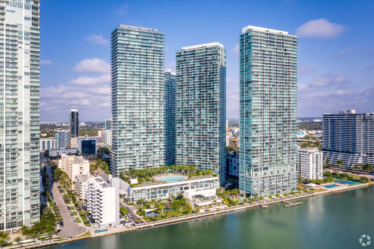Unobstructed bay views from this 2 BR/3 BA + Den at Paraiso Bay. Unit features private elevator with modern and spacious kitchen, and large terrace with breathtaking views of Biscayne Bay. Master bedroom has access to terrace, spacious walk-in closet, and large bathroom with double sinks. Unit is delivered with porcelain floors installed, roller linen shades with blackouts in bedrooms. Amenities include waterfront pool area, lounge room, spa, gym, tennis courts, theater room, and more. Tenant Occupied.