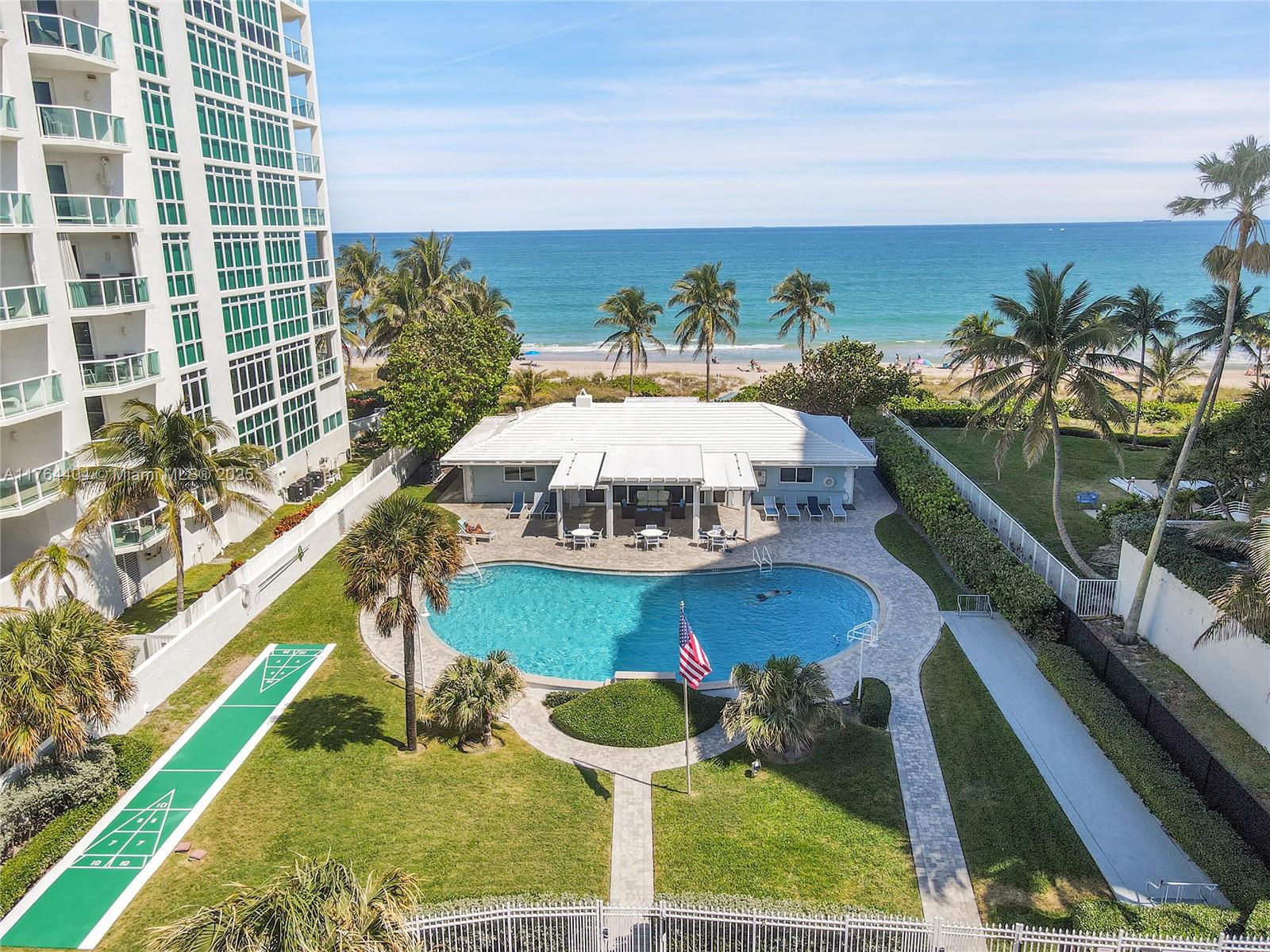 Beachside Living in One of the Larges Homes in The Palm Yacht and Beach Club. 3 bedroom/3.5 baths/ 2 car garage.  Updates include an open floor plan with large kitchen, All Impact windows and doors, large white rectified porcelain tile throughout.  All 3 bedrooms have en-suite baths.  The private 99 home community has a free marina for up to 42’ boat (currently wait-listed), a heated pool and beach club with 100' of beachfront property.  Maintenance includes HO and flood insurance, roofs, grounds, yard watering, clubhouse, marina, garbage, exterior home painting, staff and full time on-site management.  This is a 55+ community (see attached Rules & Regs), two pets up to 15 lbs allowed. One time club membership fee of $2,650 applies. Best Buy East of the Intracoastal~ $378 per Sq. Ft.!
