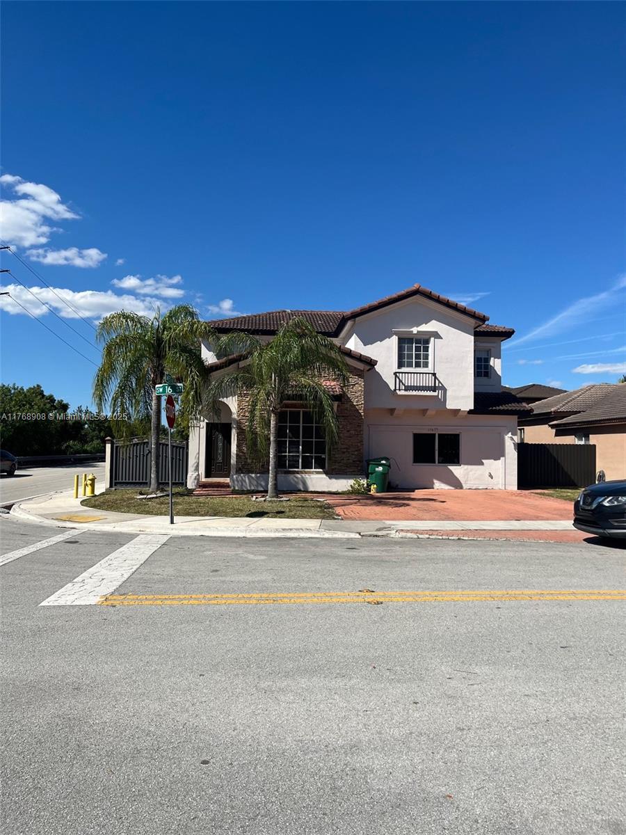 Beautiful corner Single-family home, 5-bedroom, 3-bath, ***NO HOA*** plus converted garage 1/1 law suite, with a permit,  EXTRA INCOME, for the first buyer family or investors,  desirable area West Kendall, close to Turnpike. Spacious home with abundant natural light and room for entertaining. One Room downstairs is used for an Office or gym Porcelain tile floors, a huge and open kitchen with SE appliances, a granite counter with island wood cabinets, new A/C. The Master bed has a huge walking closet and bathroom, and extra storage, The spacious back yard, with an avocado tree, nice size for entertaining, with a barbecue area., Space for pool, Located near Top Schools, parks, and shopping. Please call the Listing Agent today to schedule, showing 24 hours in advance.
