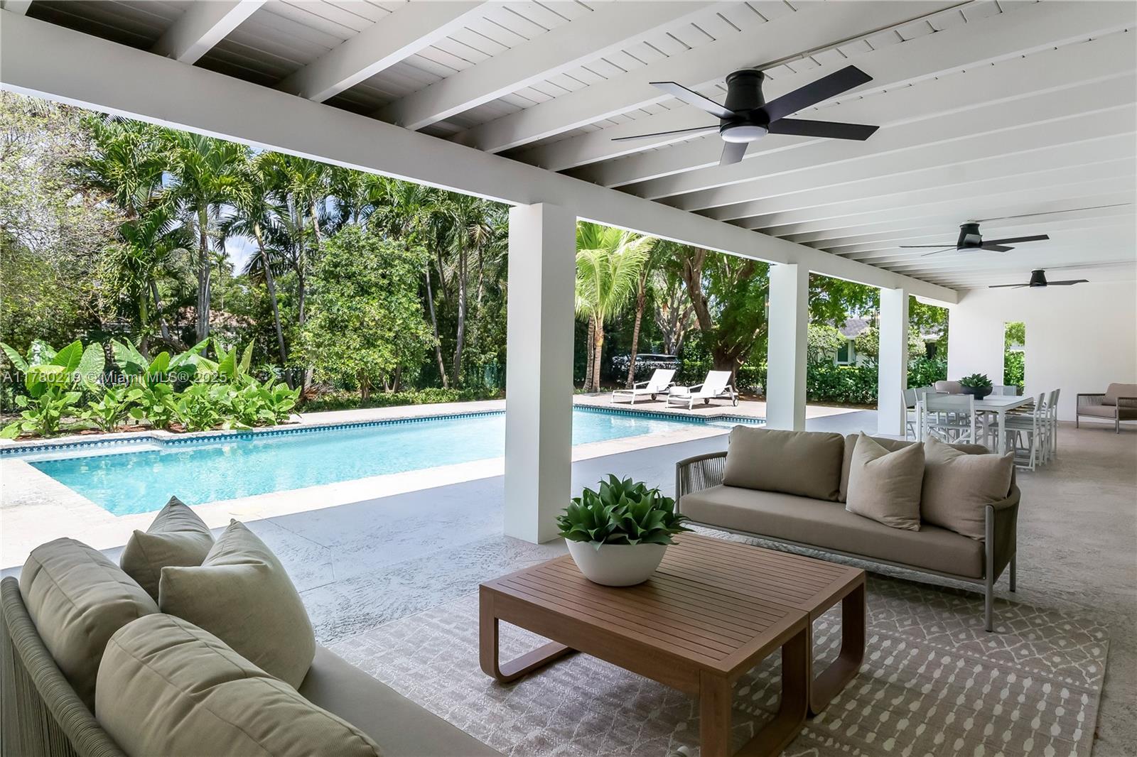 This beautifully remodeled, move-in ready home in North Pinecrest features 4 bedrooms, 3 bathrooms, and a versatile 5th room perfect as a bedroom or home office. A stunning front door sets the tone as you step inside to an abundance of natural light and an inviting layout that flows effortlessly through thoughtfully curated spaces. Every detail reflects style, warmth, and comfort.Enjoy a spacious and functional laundry room, along with impact windows and doors. Step outside to unwind or entertain in a beautifully landscaped backyard featuring a sparkling pool, spacious terrace, and lush greenery. Nestled on a tranquil street near incredible schools, with convenient access to major highways.Come experience Pinecrest living at its finest.Actual total living area per appraiser is 2774 sq. ft.