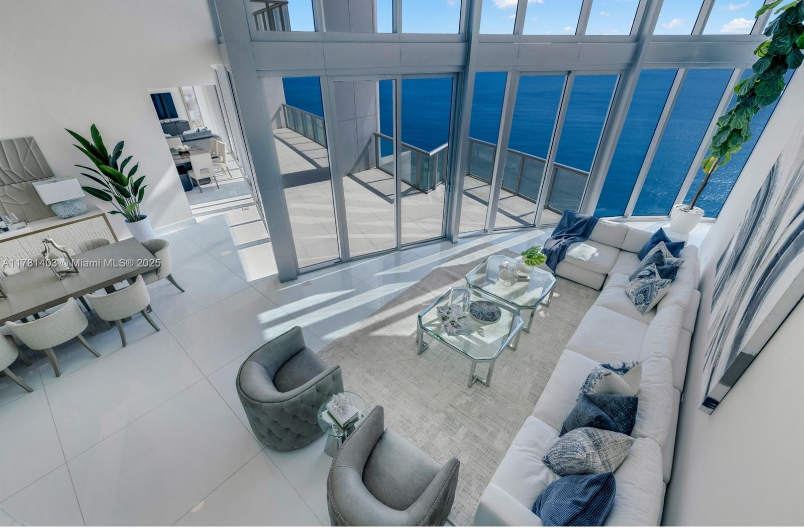 Exceptional 43rd-floor Duplex Penthouse at Jade Beach in Sunny Isles, offering 4,141 SF of sophisticated living. This stunning two-story residence features soaring 22’ ceilings, a private elevator, and floor-to-ceiling windows showcasing panoramic ocean, intercoastal and city views. Enjoy a flow-through layout with four spacious terraces, maid’s quarters, flexible space for office or lounge, and a sleek modern staircase. The gourmet kitchen includes Miele appliances, SubZero refrigerator, built-in coffee system, two ovens and wine cooler. The luxurious primary suite offers two walk-in closets and dual bathrooms. Electric blinds throughout. Jade Beach provides world-class amenities: beach and pool service, spa, fitness center, and playrooms. Minutes from Bal Harbour and Aventura Mall.