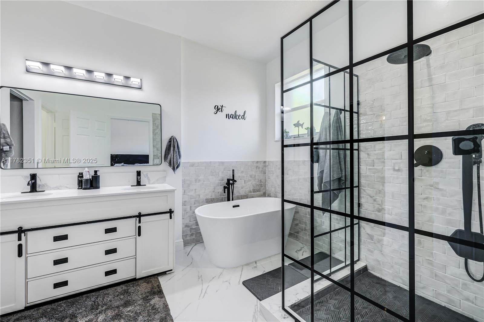 Welcome to this beautifully remodeled townhome in the highly sought-after, family-friendly Isles of Bayshore. This meticulously maintained home features elegant porcelain tile flooring throughout, no carpet! Enjoy the updated kitchen and bathrooms with modern finishes, plus a finished 1-car garage. The open layout offers spacious living, dining, and entertaining areas, along with ample closet space. Low HOA and plenty of guest parking nearby. Community amenities include a sparkling pool, playground, and full gym. With easy access to the Turnpike and US1, you're minutes from shopping, dining, and top-rated schools. Bring your pickiest buyers—this one checks all the boxes!