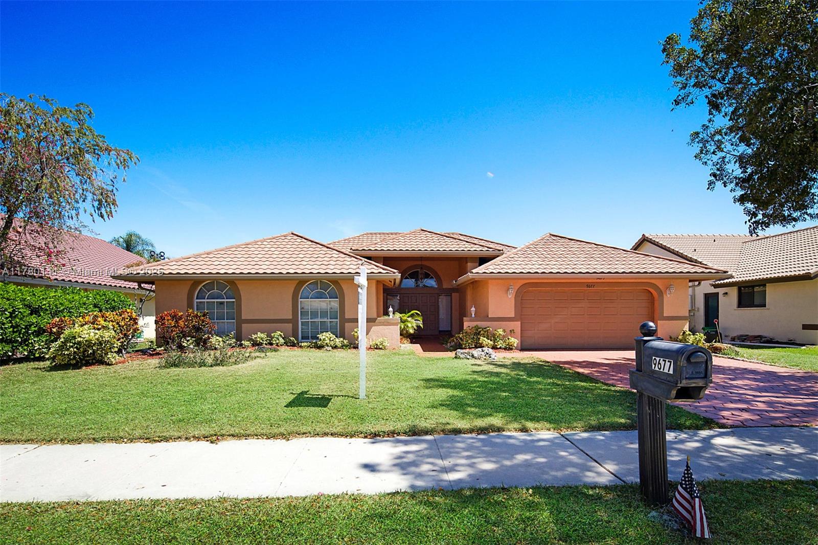9677 N Springs Way, Coral Springs, Florida image 1