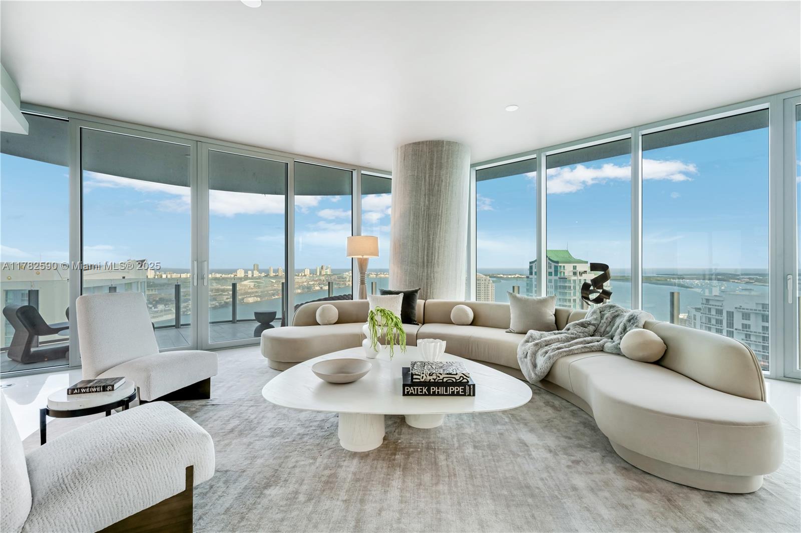 Experience unparalleled luxury in Unit 4101 at Aston Martin Residences, a 5-bed corner unit in Downtown Miami’s most prestigious address, offering sweeping bay, ocean, and city views from a wraparound terrace. This brand-new residence exudes sophistication with white marble floors, a Bulthaup kitchen, and Gaggenau appliances, while residents enjoy 42,000+ sq ft of amenities spanning floors 52-55, including a pool, spa, and gym. Featuring two assigned parking spaces, remote access, semi-private elevators, and a private lobby, this residence presents a rare blend of privacy and prime location.