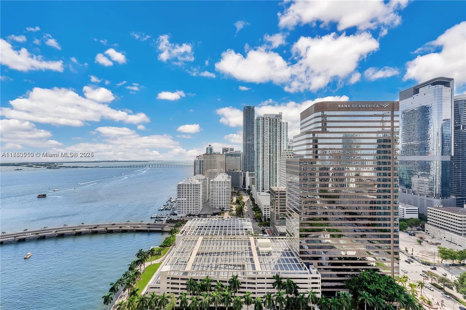 2 Beds/2 Bath + DEN. Den is equipped with modern sliding door that encloses it and can serve as another bedroom. Stunning direct water views from every room and panoramic Miami skyline views. Spanning 1450 sq ft this sophisticated apartment offers granite countertops, stainless steel appliances, porcelain floors throughout. 1 parking spaces assigned. Building offers some of the most luxurious top of the line amenities in all of Brickell including: Bayfront pool, fully equipped fitness center, Spa,  theater room, valet parking and much more. Luxury restaurants like Cipriani on the first floor.