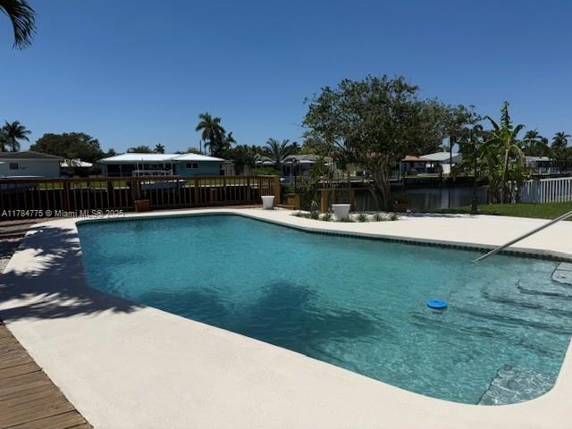 BEAUTIFUL & Luxurious waterfront estate on wide canal w/ocean access l! Boater's Dream!  Remodeled 3-bed, 2 bath single-family home close to beach, shopping,  highways. Modern open kitchen with high-end appliances. The split-bedroom layout offers privacy, main bath includes a double-sink vanity. Enjoy incredible sunsets. The lushly landscaped backyard is an entertainer's dream with a private pool and dock—perfect for waterfront living. No HOA! 
Magnificent West Water views from large Family Room. High impact doors & windows - new A/C duct system - Natural gas, gas range and water heater - Custom kitchen kalamata quartz countertops and backsplash, island w/cabinetry under the counter top- new bathrooms with LED lighting - CIRCULAR driveway -  ENJOY ENTERTAINING SOUTH FLORIDA LIVING STYLE!