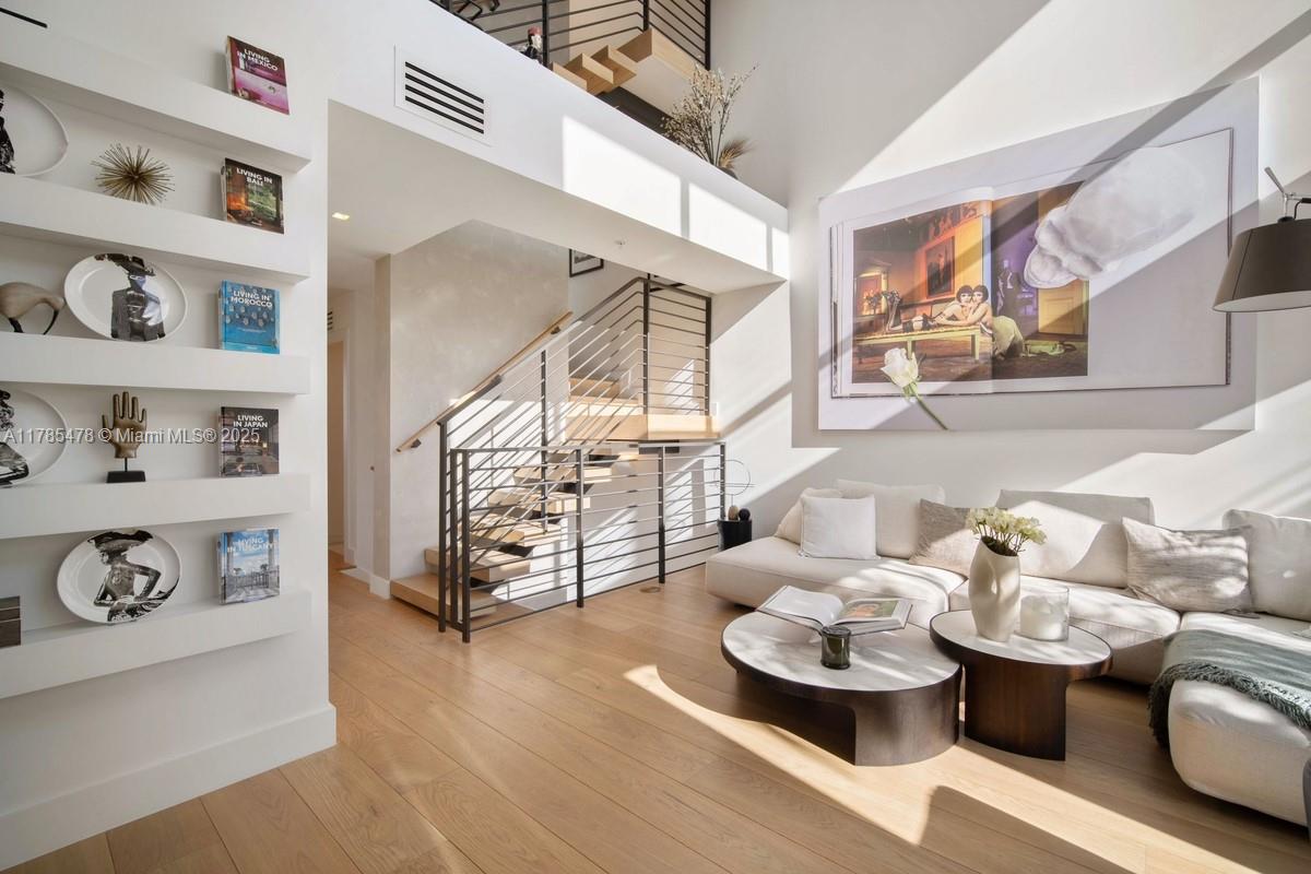 Built in 2020, Stunning 3 bedrooms, 3.5 bathrooms designed and decorated by interior designer. 4 story townhouse in Miami Beach featuring 2 car garage, private elevator with access to all floors, large rooftop terrace w/ summer kitchen. Flos lighting throughout, motorized window treatments & speakers automated and operated with Crestron smart home system. Soaring 20-foot ceilings in living area, modern European kitchen,top-of-the-line Sub-Zero & Wolf appliances. Gas cooktop & marble backsplash, 8-1/4” Italian white oak flooring throughout. Spacious master bathroom with soaking tub & steam shower. Full-size laundry room & large walk-in custom closets. Impact windows & doors. Complex has a beautiful waterfront pool. Unit is offered unfurnished, select furniture is available for sale.