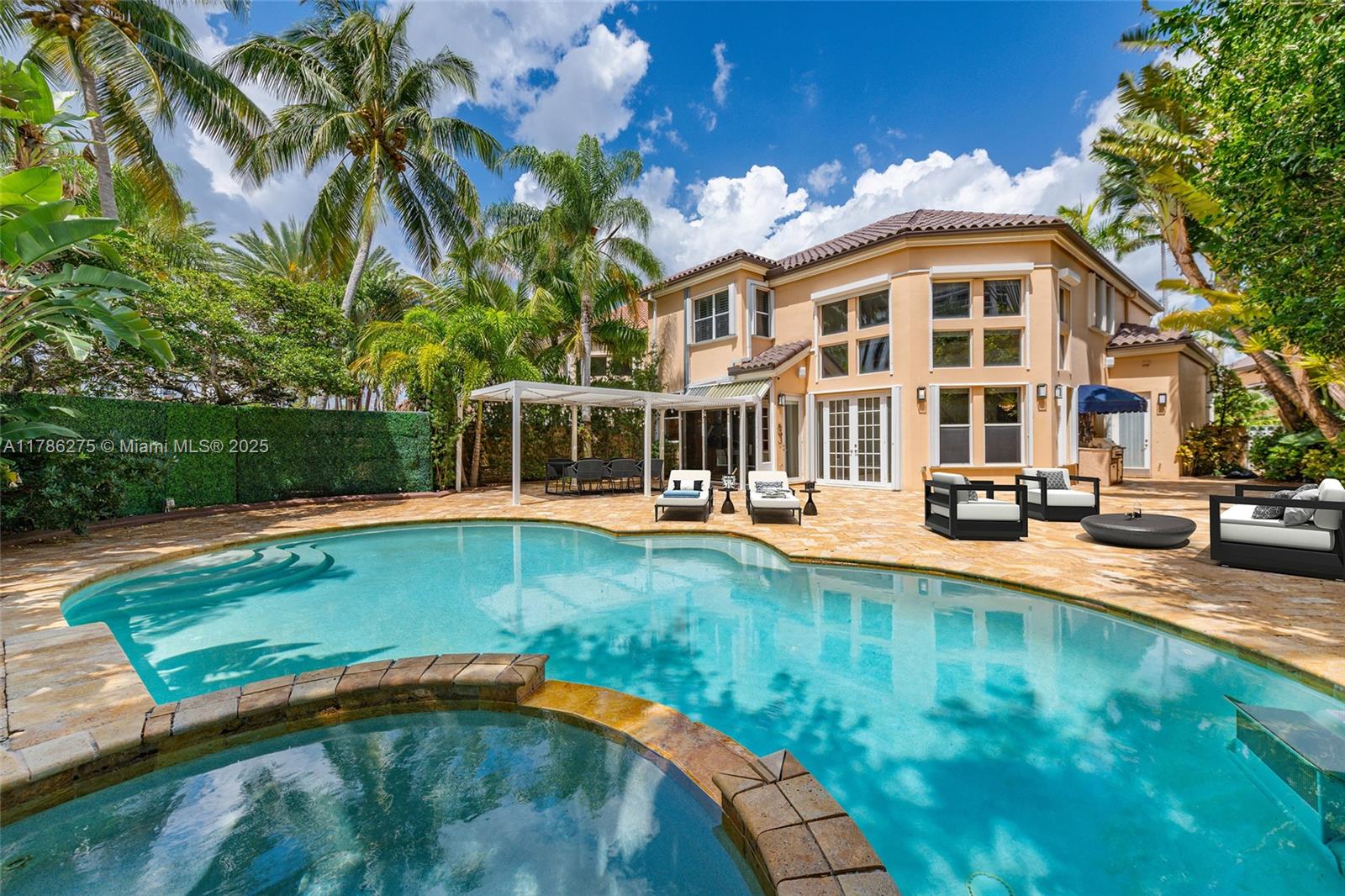 Nestled in the exclusive gated community of Island Way, this stunning single-family home offers the perfect blend of comfort, elegance, and outdoor luxury. Featuring 5 spacious bedrooms and 3 bathrooms, this beautifully maintained residence is ideal for both relaxing family life and stylish entertaining.

Step outside to your own fully private paradise with a lushly landscaped backyard, designed for ultimate South Florida living. Dive into the sparkling pool, soak up the sun on the expansive patio, or enjoy al fresco dining in the serene, entirely fenced outdoor space. Surrounded by tropical greenery and privacy hedges, this backyard retreat feels like a luxury resort. Walking distance to the Aventura circle where you can jog or work out with peace of mind. Make your appointment!
