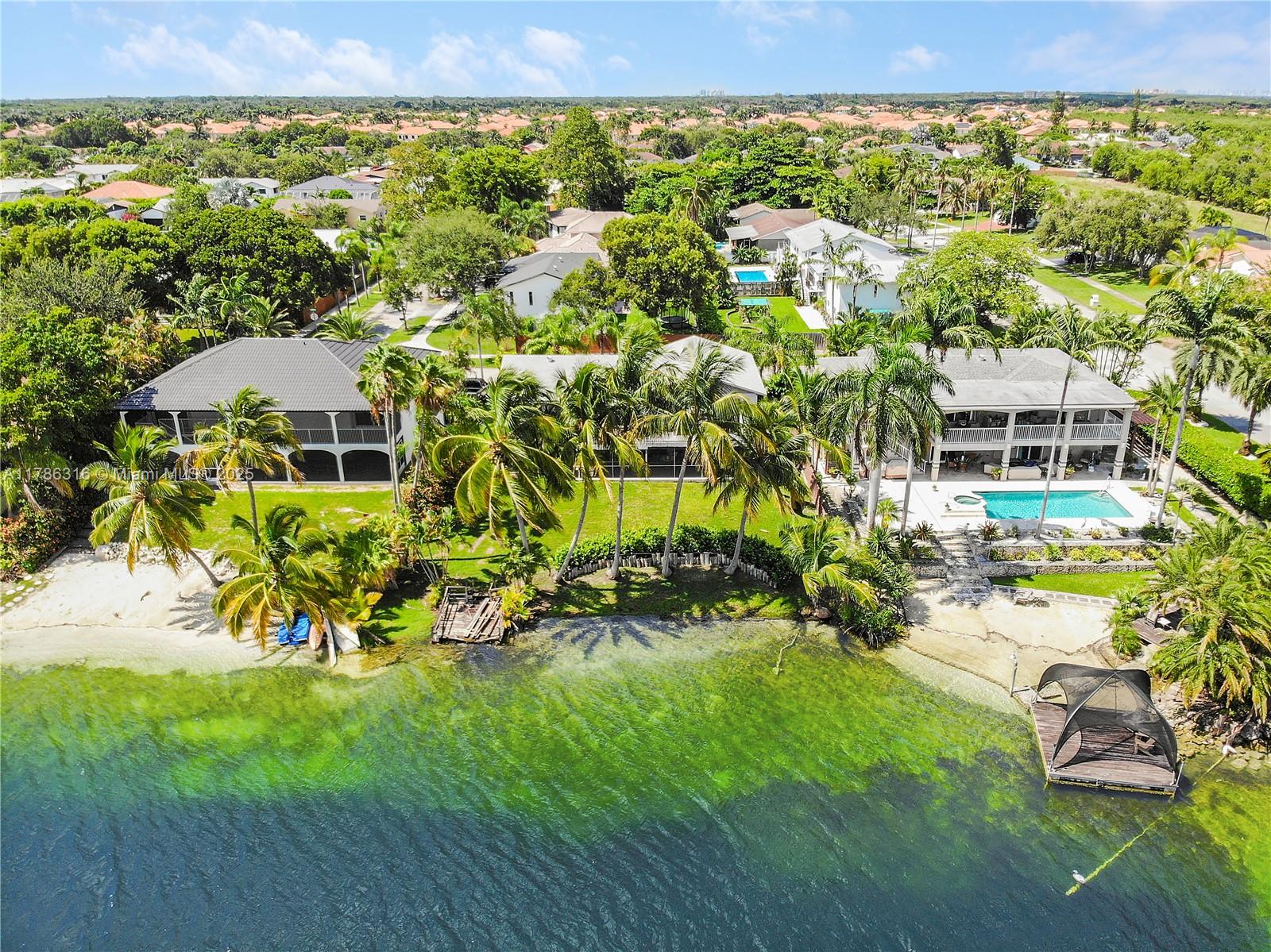 This spacious 4-bed, 3-bath lakefront home offers over 3,000 sq ft of potential and stunning views! This home is a steal! Situated in a highly desirable single family neighborhood, this property boasts an open floor plan, large windows framing the lake, and a sizable backyard ideal for entertaining. Whether you're looking to update and capitalize on the generous square footage and value of this home or reimagine it for future buyers, this is a must-see opportunity!