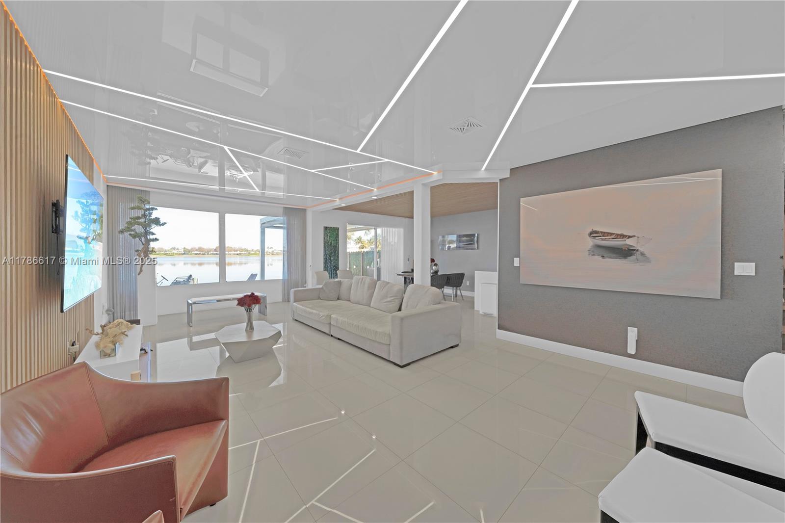 Discover this spacious 4-bedroom, 3-bathroom townhome nestled in the prestigious gated community of Doral Isles. Built in 2000, this two-story residence offers 2,287 sq ft of living space, featuring an open-concept layout with abundant natural light. The home boasts a modern kitchen with stainless steel appliances, a generous living area, and a private patio perfect for outdoor entertaining. New impact window and doors. Residents enjoy access to resort-style amenities, including a clubhouse, fitness center, swimming pools, and tennis courts. Conveniently located near top-rated schools, shopping centers, and major highways, this property combines comfort and convenience in one of Doral's most sought-after communities. Don't miss the opportunity to make this exceptional home yours!?