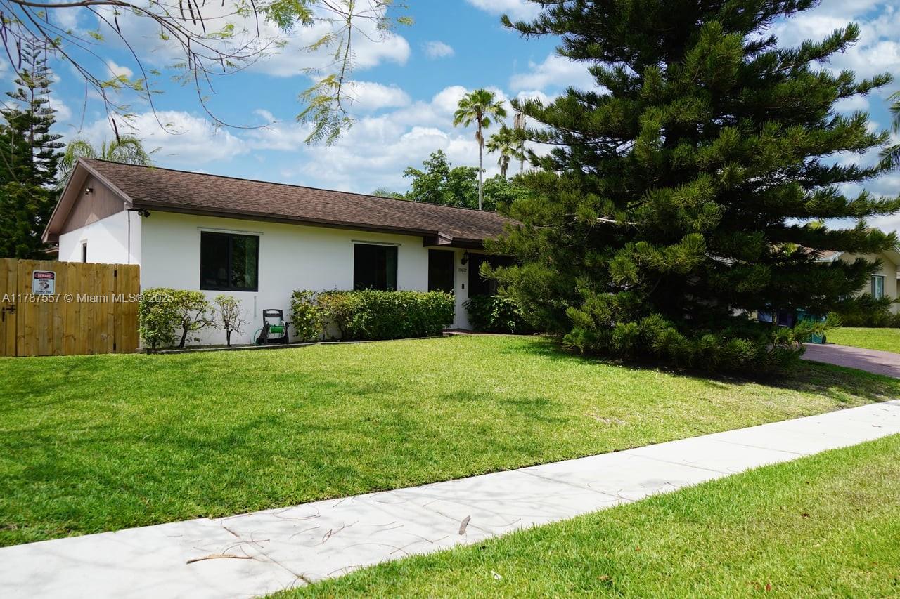 This stunning property has been updated from top to bottom—no detail has been spared. Featuring impact windows, upgraded electrical, and a beautifully redesigned kitchen, it’s truly move-in ready. Enjoy the convenience of a spacious double car garage and ample room to park your boat or RV, complete with an RV electrical hookup. Step outside to your covered terrace—perfect for entertaining or relaxing in the shade. Plus, there’s plenty of space to add the pool of your dreams.