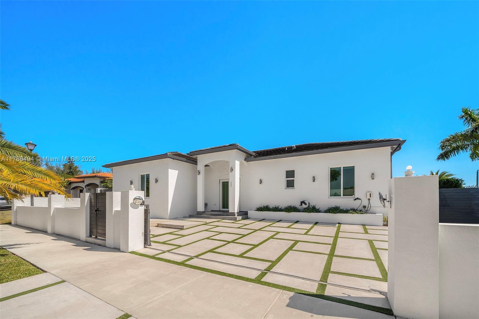 Modern living next to Saga Bay Park. Step into elevated living in this beautifully built 2016 home, perfectly positioned right next to Saga Bay Park. Enjoy effortless access to tennis and pickleball courts, a scenic walking path, and playground—all just steps from your front door. Built with storm protection in mind, the home has the distinct advantage of being built at a higher elevation. Inside, enjoy soaring 12-foot ceilings, generously sized refrigerator, wine fridge, and jetted tub in the primary suite for a spa-like retreat. The backyard is a private oasis with a covered patio and sparkling saltwater pool with fountains. Also features an electric vehicle charger and the substantial benefit of no HOA fees. Modern, low-maintenance living in one of the area’s most desirable locations.