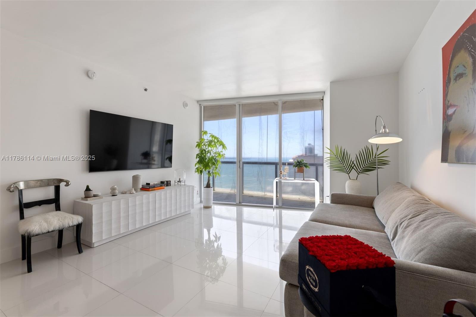 A spacious & bright 1 Bed, 1 Bath condo w/ over 1,000 interior sq ft, white porcelain tiled floors in living areas, marble floors in the bathroom, motorized shades, a large walk-in closet, kitchen appliances by Wolf & Sub-Zero, 10-foot-high ceilings w/ floor-to-ceiling glass windows, and breathtaking views of Biscayne Bay & city skyline from the 35th floor. The largest one-bedroom floor plan at Icon Brickell. Includes 1 assigned parking space. Monthly condo dues cover basic cable TV, high-speed internet, and water. Building amenities include a 300-foot-long swimming pool, 50-person hot tub, movie theater, a 28,000-square-foot spa & fitness center, full-service concierge, on-site restaurants, and more. Within blocks of the shops & restaurants at Brickell City Centre & Mary Brickell Village.