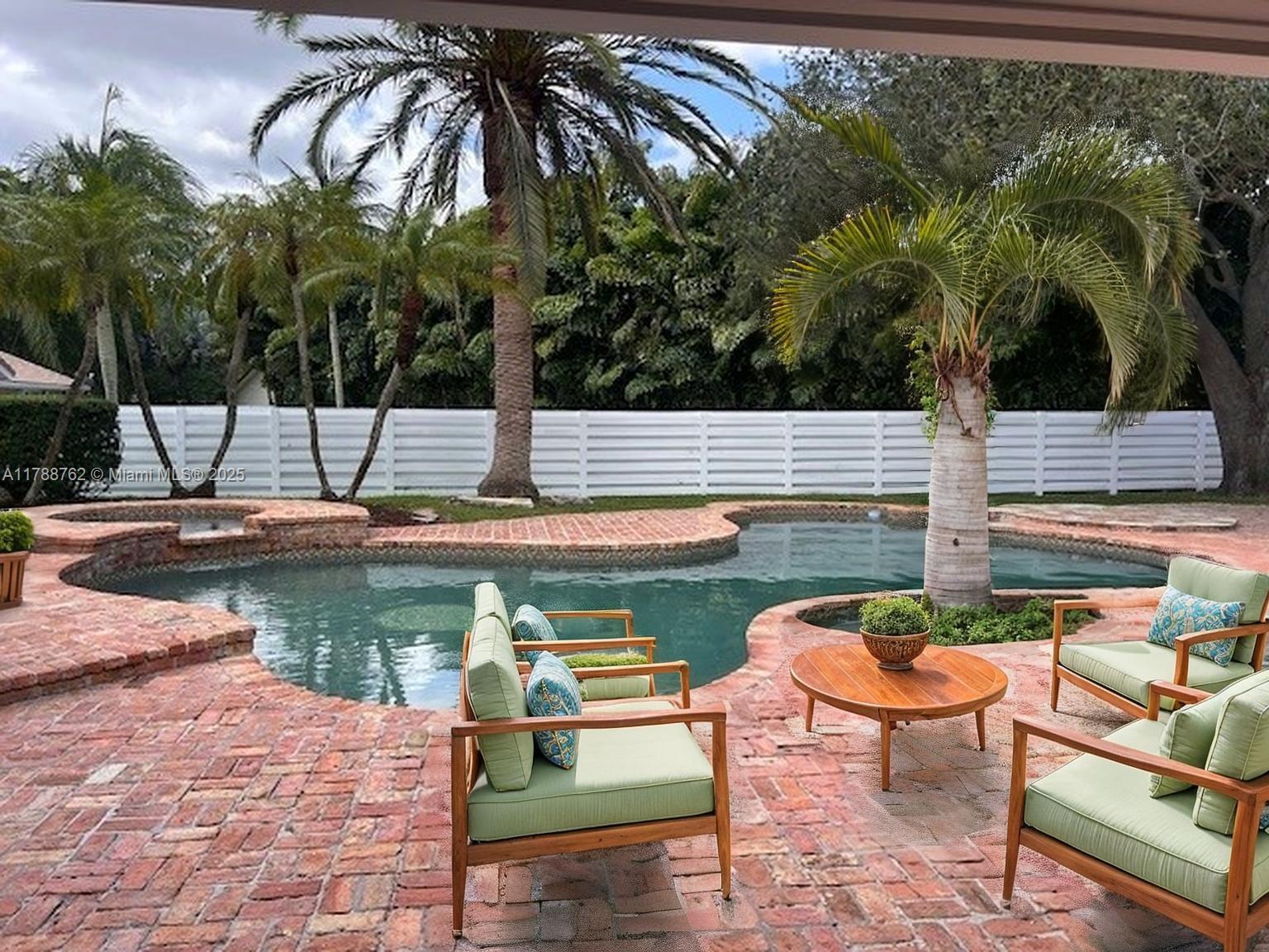 Sought after one-story CBS home, offering 4 spacious bdrms, 2.5 baths w/ two-car garage—situated on an oversized lot. Expansive living areas & granite kitchen that overlooks a classic Chicago Brick-style pool & patio, privately fenced. This home features impact windows installed in 2016, laminate wood in bdrms and tile in living area. Located in a quiet neighborhood, the property abuts an association-owned green space, providing added privacy. Additional highlights include a brand new HVAC system, freshly painted interior & exterior, new pool motor, and an expanded laundry room with new washer/dryer. Oversized guest rooms offer flexibility for office space or multi-generational living. This home has all the right bones—just needs your personal touch to make it truly shine!