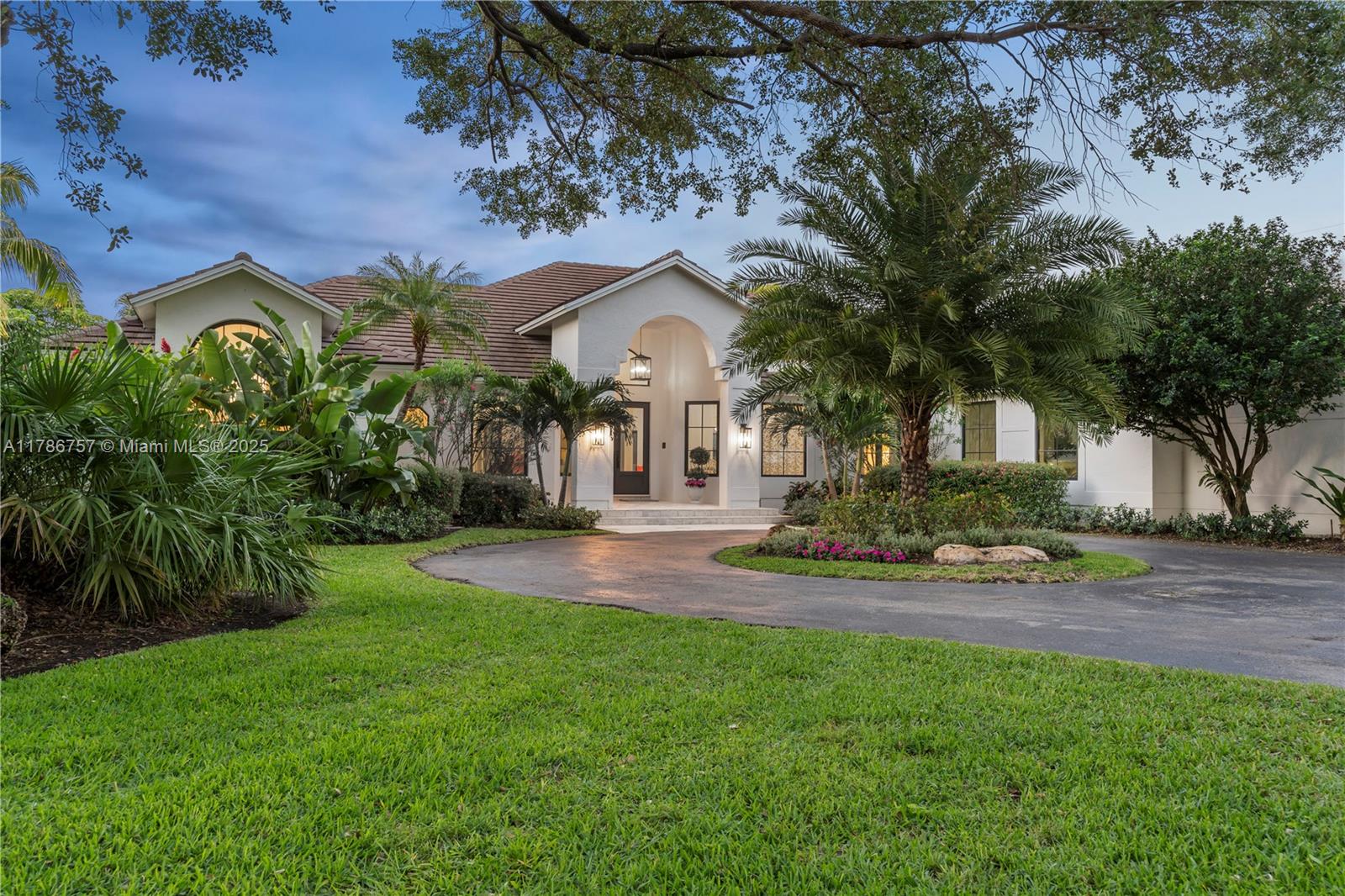 Palm Beach meets Miami in this remodeled one-story N. Pinecrest Gated Estate on a 36,851 SF Lot with high ceilings & custom finishes! This 5BD / 4.5BA home ftrs voluminous entertaining spaces w/ grand living room, formal dining & large family room adjacent to the chef's kitchen w/ diner-like breakfast nook, custom cabinetry, SubZero fridge, coffee station, & ILVE Gas Range w/ pot filler. Expansive primary suite ftrs a seating area, 2 walk-in closets & zen bathroom. Backyard ftrs covered terrace by the pool with plenty of yard space for a playground, in-ground trampoline, & more. XL laundry room w/ 2 washers, 2 dryers, & built-in drying racks. Privacy wall w/ 2 gated driveways, 3 car gar. w/ AC, impact windows/doors, 2021 Roof. Close to top schools & parks! It's not Miami, it's Pinecrest!