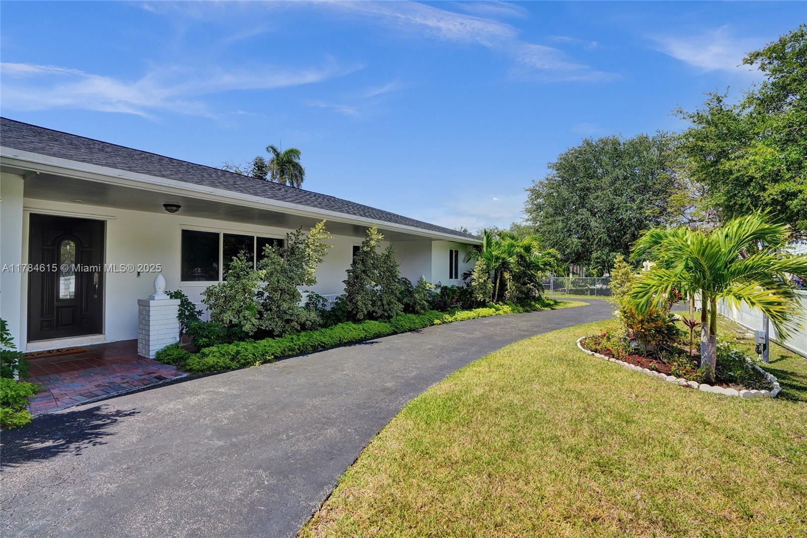 New listing in sought-after Pinecrest! This 4-bedroom, 2-bathroom home features a separate office space, perfect for working from home. Enjoy peace of mind with an electric gate, impact windows & doors, a new roof, newer A/C and fully functional sprinklers. The oversized tiled patio flows into a beautifully fenced backyard with a resurfaced pool and charming gazebo—ideal for enjoying the outdoors & entertaining. The spacious kitchen boasts abundant wood cabinetry and granite countertops. Surrounded by privacy trees & beautiful landscape by Anderson, this home is a true tropical retreat. Located within walking distance to Palmetto Senior High whose graduates include Jeff Bezos and Katanji Brown.  A fantastic home for the price with no sunken areas and a fantastic layout.