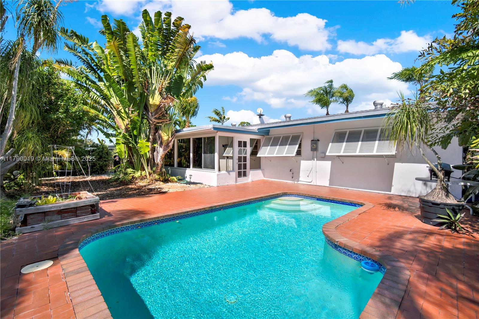 Charming Cutler Bay home with vintage appeal and tropical vibes! Originally 3 beds, now 2 with a large primary suite, 2 full baths, small pool, and lush backyard. Can be converted back to a 3 bedroom home. Plenty of space for boat/RV parking. Well maintained and move-in ready with opportunity to update over time. Walk to the upcoming Legacy Park, town hall, community pool, and Shops at Cutler Bay (Publix, dining, health center). Located in a golf cart-friendly neighborhood. A great chance to build equity in a prime location!