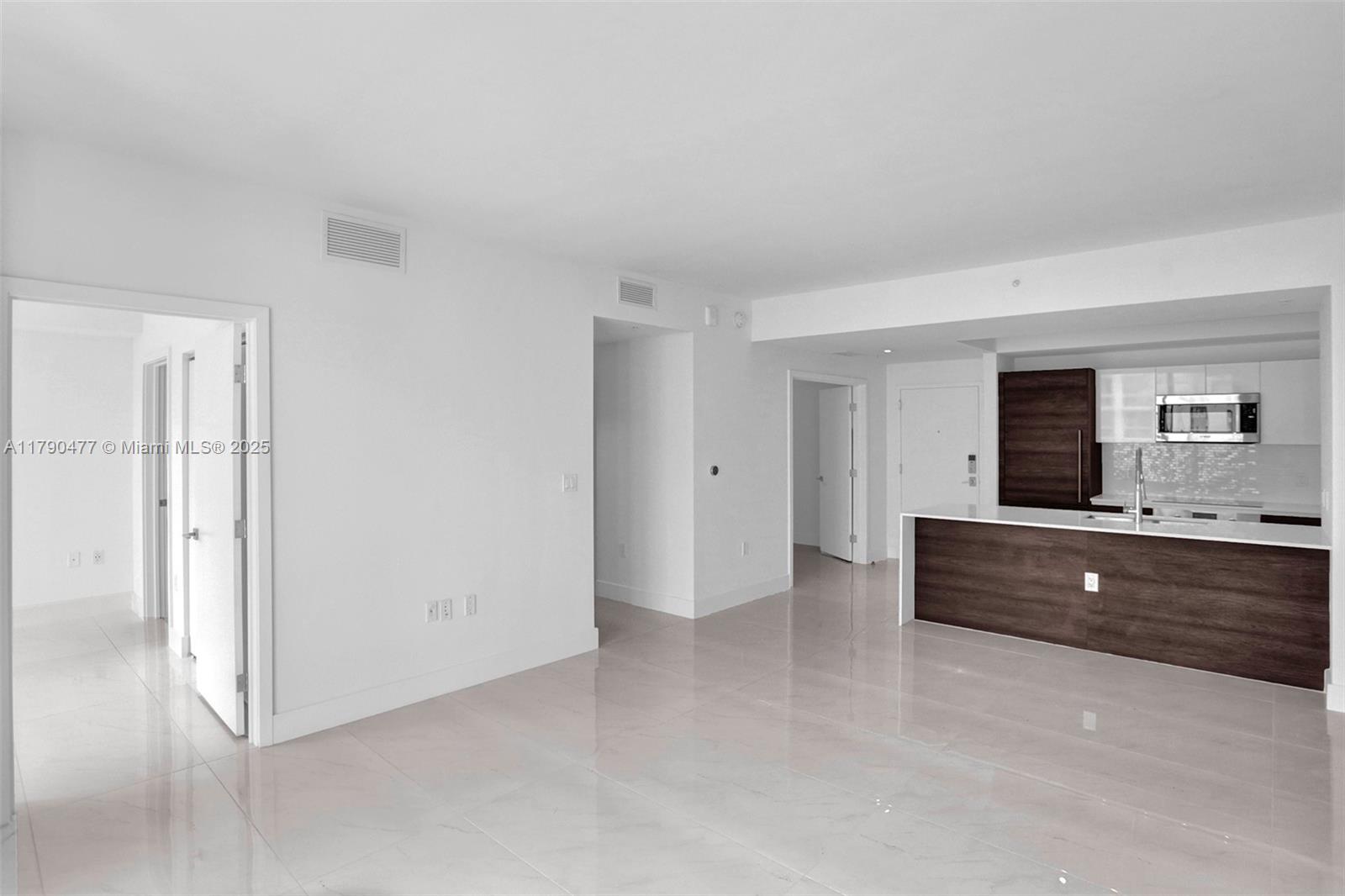 AVAILABLE JUNE 14th, 2025. SPACIOUS 1 BD + DEN/1 BATH UNIT WITH NICE VIEWS, SQF 778. Live in the premier new development of Merrick Manor with gorgeous views of the parks and Coral Gables! This Mediterranean villa-style residence is located in a heart of Coral Gables. This unit features walk-in closet, built-in Bosch appliances, white quartz countertops, spacious bathroom, and washer & dryer in the unit. Unit comes with 1 assigned garage parking space. Merrick Manor is conveniently located just steps from the fashionable shops of Merrick Park and a school right across the street. Merrick Manor offers a variety of amenities that include a big pool, gym, recreation room, media room, BBQ, and a 24-hr concierge. Pet friendly.
