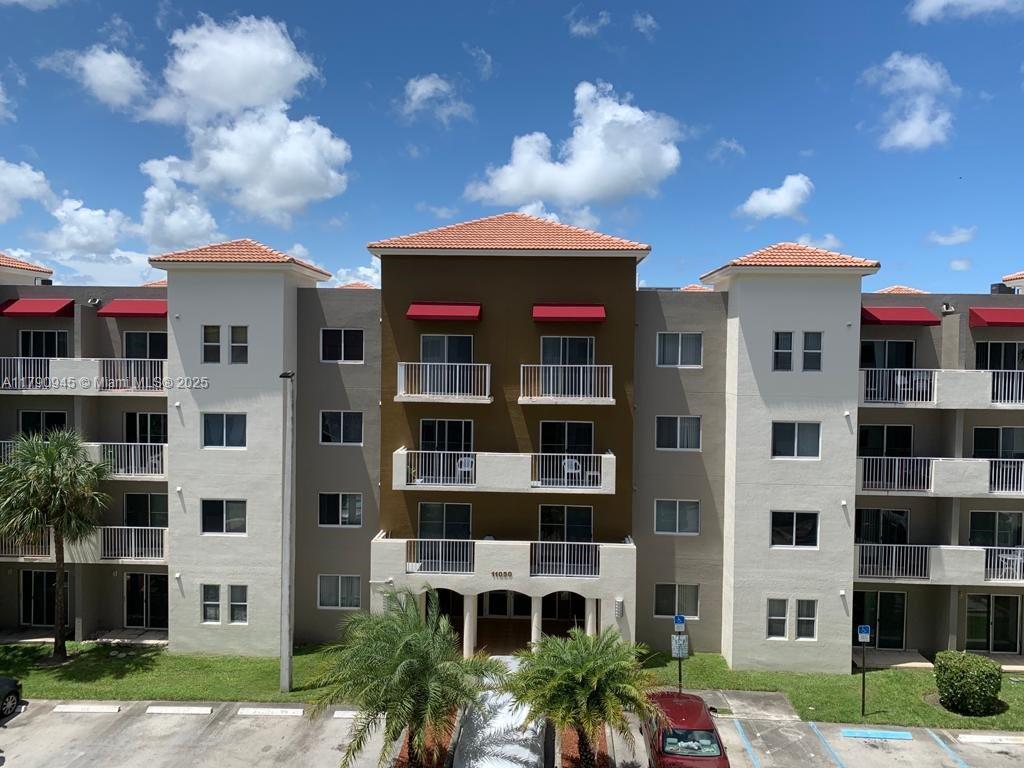 ATTENTION INVESTORS JUST RENTED UNTIL MARCH 31ST 2026. CORNER UNIT WITH BALCONY, WASHER AND DRYER, TILE FLOORS, WALK IN CLOSET, DINING AREA AND LIVING ROOM AREA, OPEN KITCHEN. ENCLOSED CONDOMINIUM WITH 2 POOLS, CHILDREN PLAYGROUND, CONVENIENCE STORE FOR RESIDENTS USE, SECURITY GUARD 24/7, MANAGEMENT ON SITE, BUILDING HAS 2 ELEVATORS AND DIALING PAD IN MAIN DOOR.