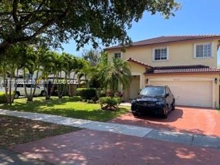 Beautiful 2-story home with 4 bedrooms and 2.5 baths in a well-maintained HOA community. Features include a 2-car garage, spacious driveway, and side parking for a boat. The primary bedroom offers a massive walk-in closet, and bathrooms feature elegant marble finishes. Enjoy the oversized backyard with a built-in grille—perfect for entertaining. Just minutes from Black Point Marina and the new Publix shopping center.