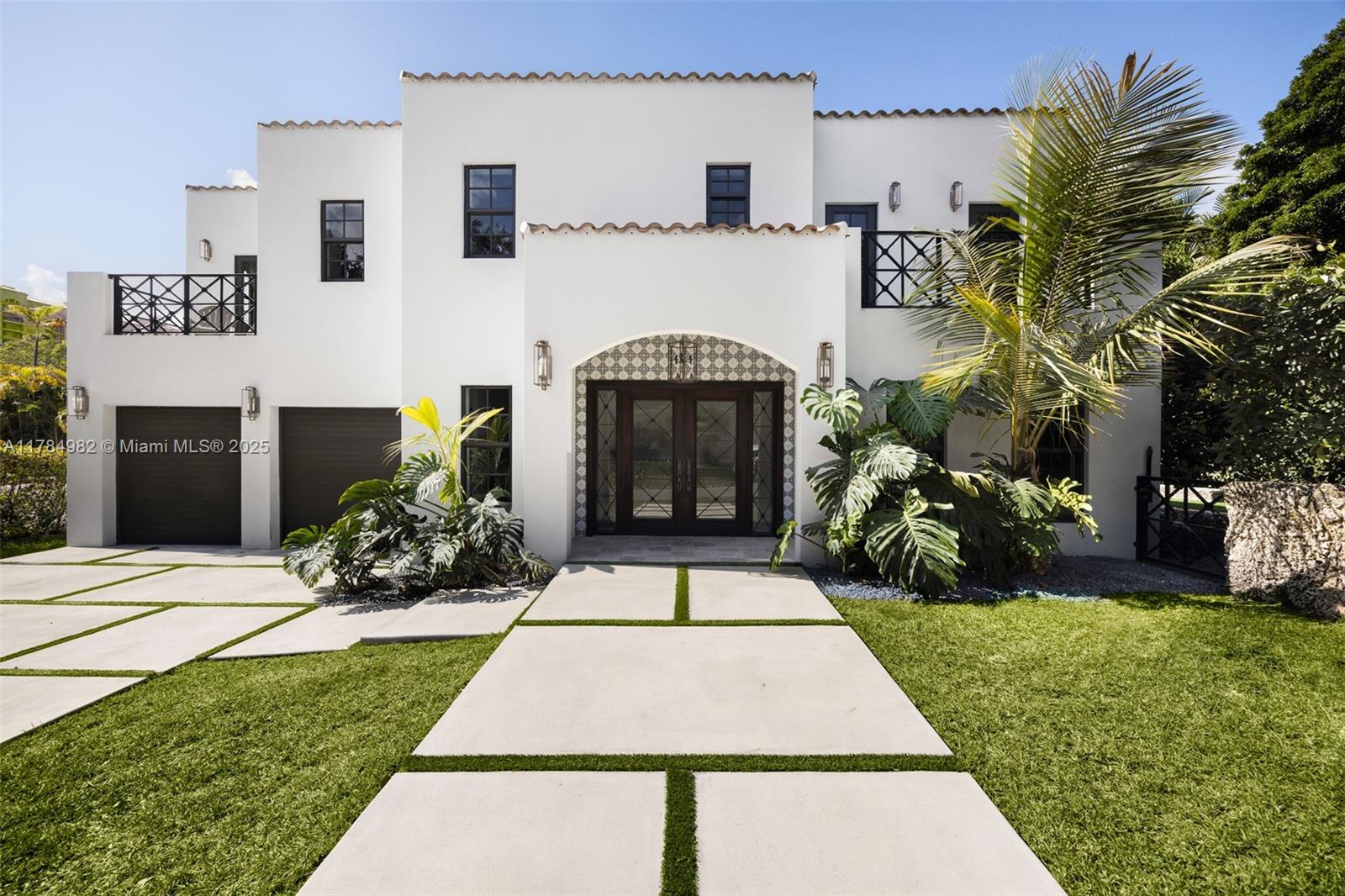 Experience elevated living in this beautifully remodeled Coral Gables home. A welcoming foyer and office nook lead to expansive living and dining areas that flow seamlessly into the gourmet kitchen and private backyard. With 5 bedrooms and 5 bathrooms, including a guest suite and mudroom on the main level, the layout is both functional and elegant. Upstairs, the primary suite offers walk-in closets, a spa-like bath, and a private balcony. Enjoy a newly turfed spacious yard with a pool, impact windows and doors, upstairs laundry, and a 2-car garage—all near top-rated schools. Welcome to Sunrise Harbour, where the Gables meets the Grove.