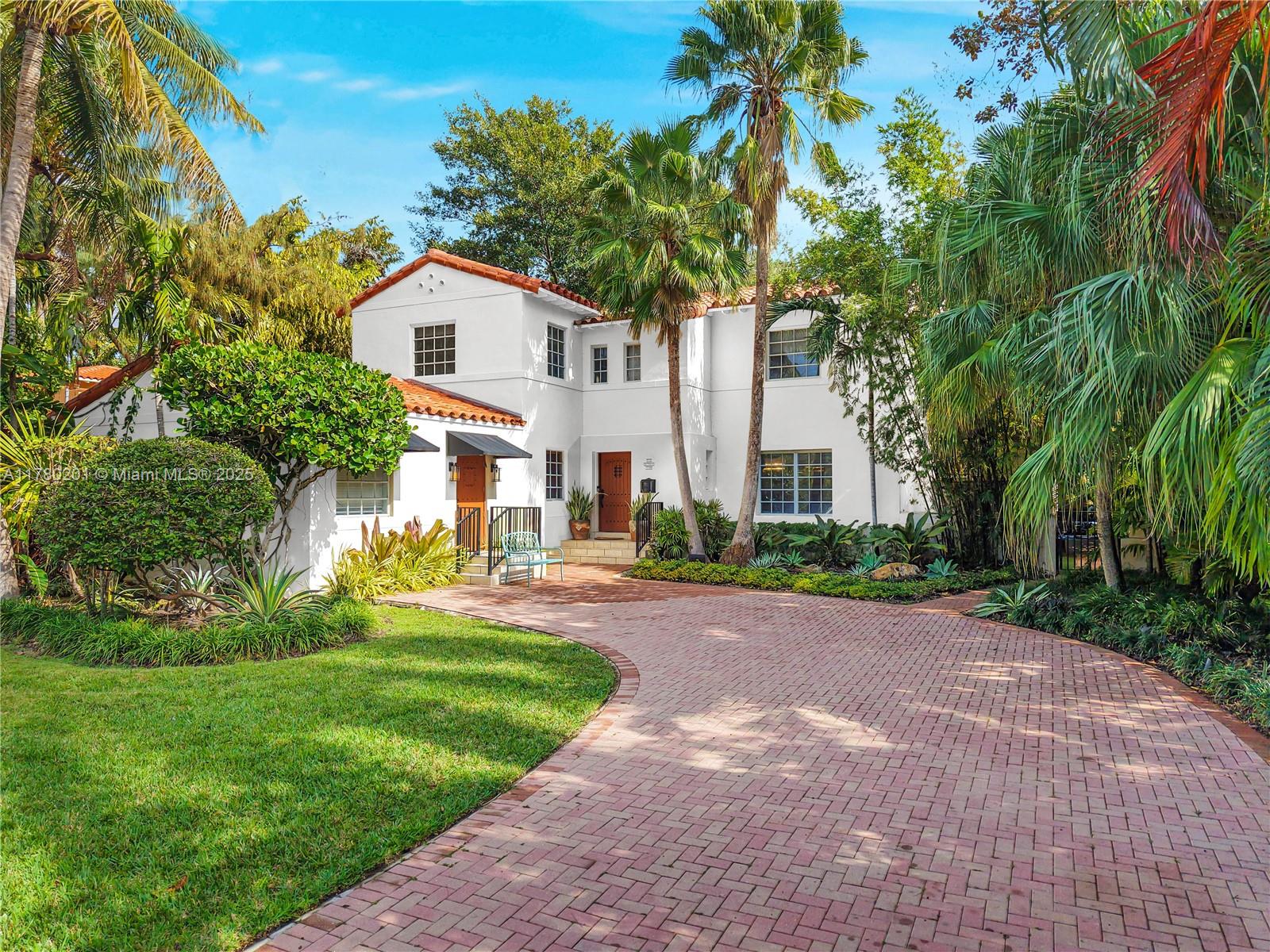 Spanish Mediterranean home set on a lush and spacious 9,680 SF lot with 3,325 SF of living space. This residence offers 5 bedrooms, 4.5 baths, a newly renovated gas kitchen, an upstairs balcony, a cozy den overlooking the backyard, and a downstairs bedroom with a separate entrance—perfect for an office or in-law suite. Step outside to your private resort-style oasis with a newly rebuilt heated pool, 6-person spa, tree house, play area, cabana bath, breakfast patio, and multiple outdoor living and dining areas nestled among mature trees. Located on a quiet, one-block street in the heart of Mid-Beach, this home blends classic charm with modern comfort. Minutes to the beach, parks, houses of worship, restaurants, JCC, and North Beach schools.