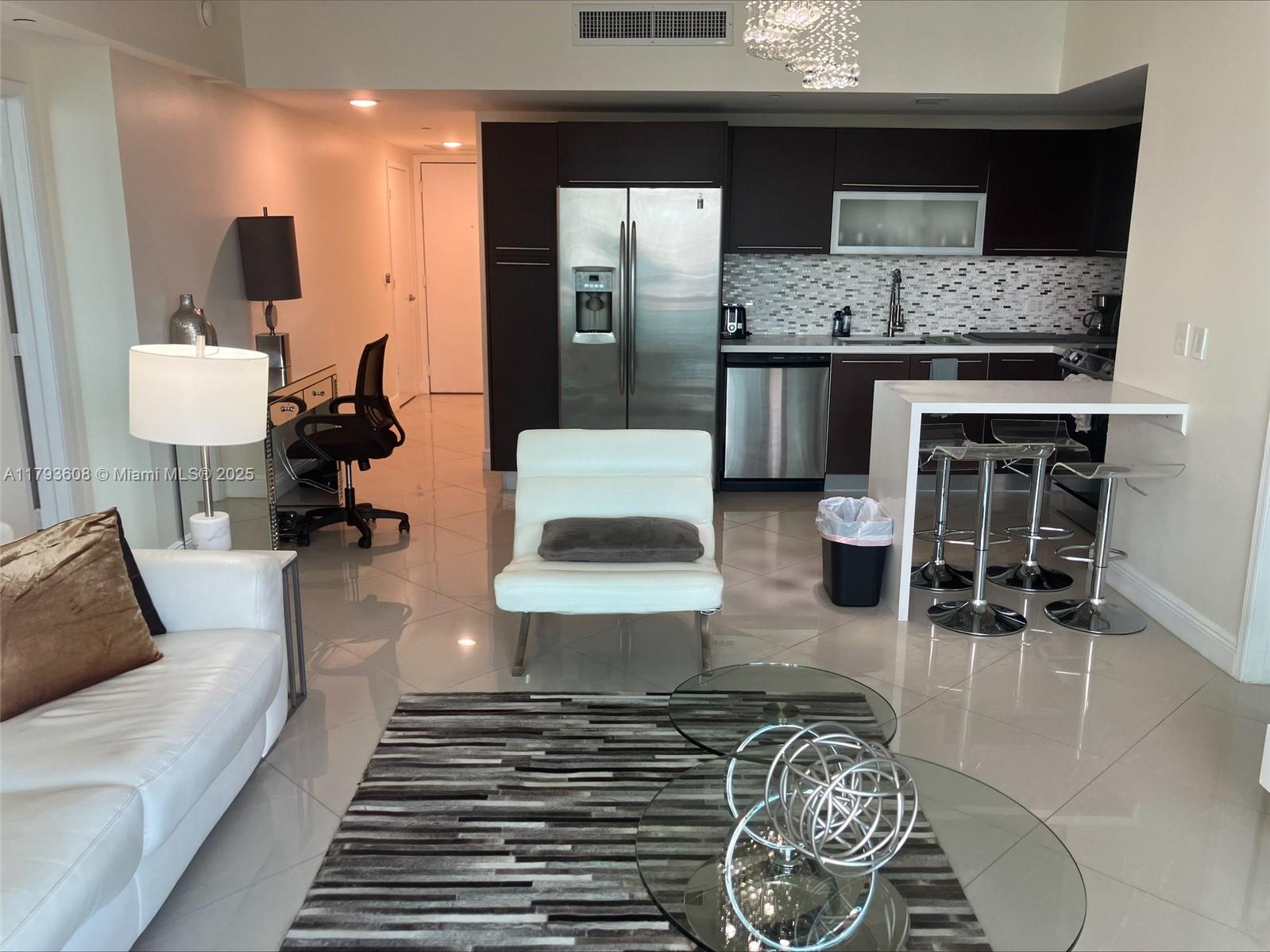 Experience upscale urban living in this elegant fully furnished 2-bedroom, 2-bathroom condo located on the 26th floor of The Plaza on Brickell. This residence offers breathtaking
city and bay views through its floor-to-ceiling windows, complemented by a private balcony perfect for relaxation. Situated in the vibrant Brickell neighborhood, you're just steps
away from Brickell City Centre, top-rated restaurants, cafes, and entertainment venues.