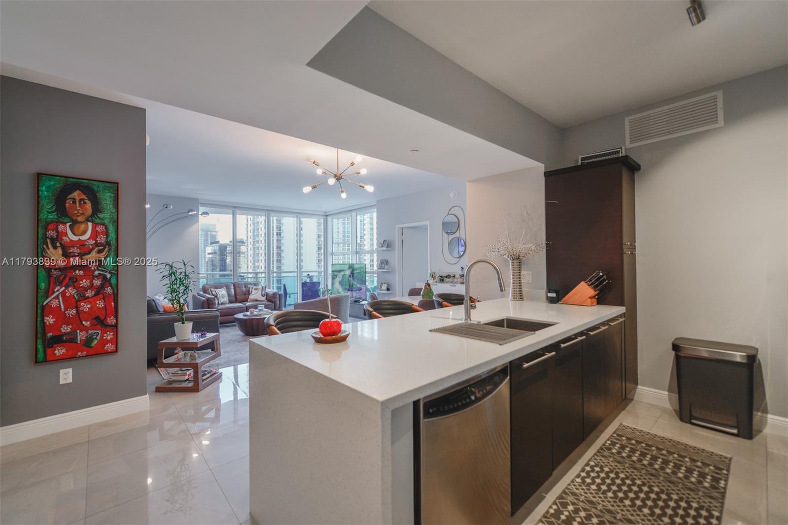 Stunning corner unit, spacious 2-bedroom, 2.5-bath residence in the heart of Brickell. This bright and modern home features sleek electric blinds, custom-built closets, new flooring, and a beautifully updated kitchen with a new countertop and convenient pull-out drawers for optimized storage. Enjoy resort-style amenities, including a pool, fitness center, clubroom, and business center. Ideally located just steps from Brickell City Centre, Mary Brickell Village, and an array of top restaurants, cafés, and shops. Experience the perfect blend of style, convenience, and luxury living.
