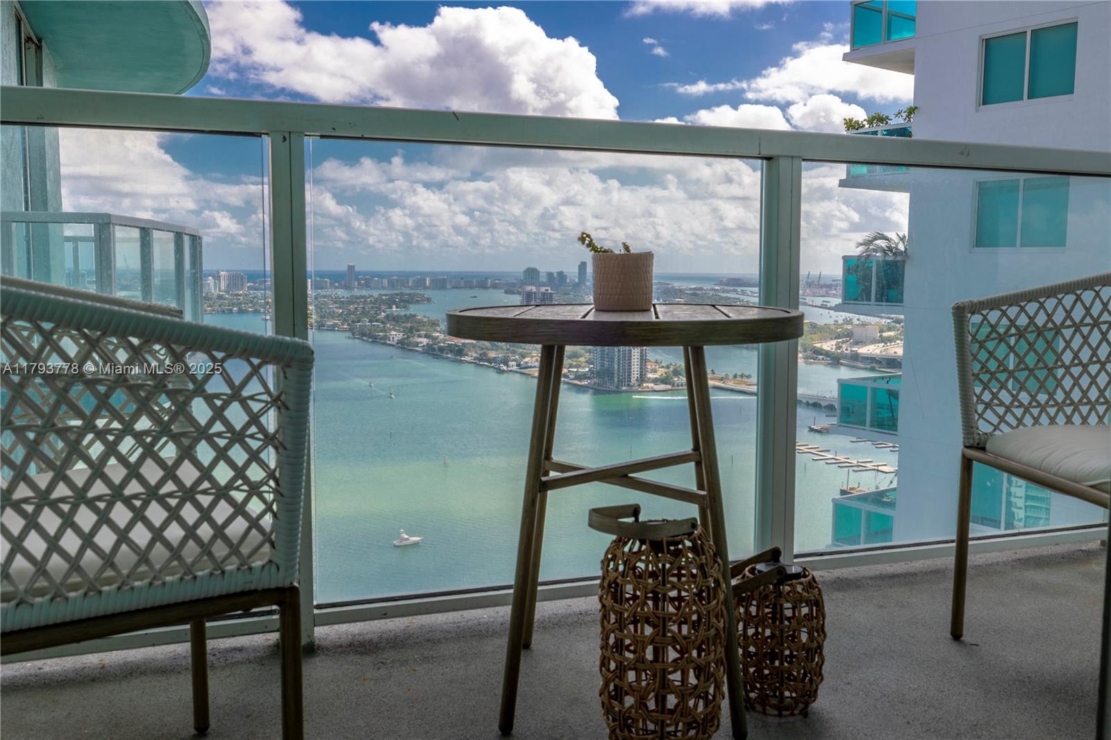 Live in the heart of Edgewater, steps from Margaret Pace Park—Miami's own Central Park. Enjoy panoramic views of Biscayne Bay and Miami Beach from this beautifully updated residence featuring wood floors, a new refrigerator, and in-unit washer/dryer. The building offers 5-star amenities: a state-of-the-art fitness center, sunrise and sunset pools, Jacuzzi, cycling studio, business center, playroom, 24-hour concierge, valet, and security. Urban lifestyle at its best—luxury, location, and lifestyle combined. Tenant in place until may 31 2025