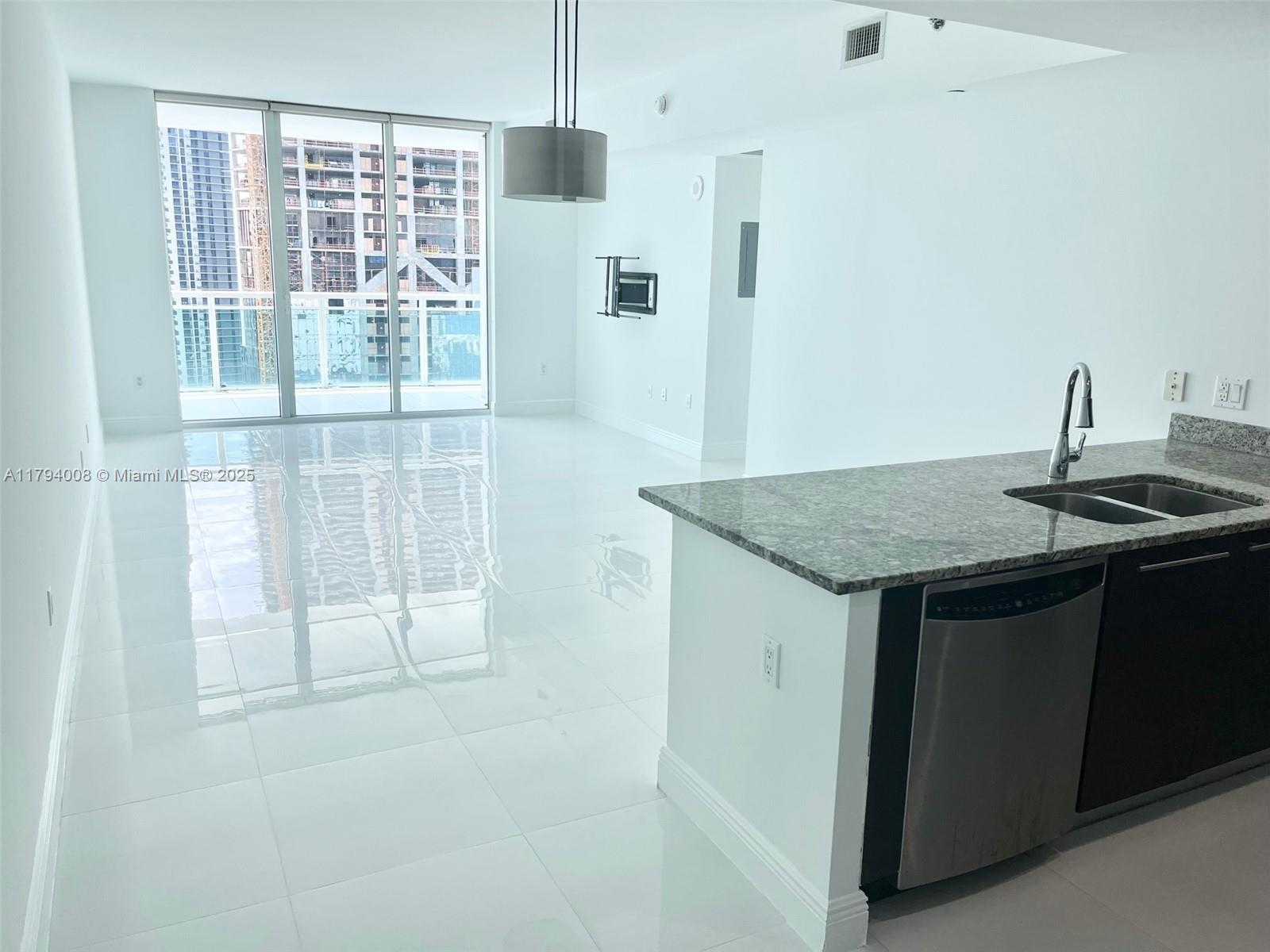 Stunning 1-Bedroom, 1-Bath at The Plaza in the Heart of Brickell. Beautifully updated and ideally located, this recently renovated one-bedroom, one-bathroom apartment at The Plaza offers modern finishes and breathtaking views. The unit features refinished porcelain tile flooring, granite kitchen countertops, stainless steel appliances, and high-end wood cabinetry. Step outside to an oversized terrace and enjoy sweeping views of the Brickell skyline and bay. Residents of The Plaza enjoy top-tier amenities, including two infinity-edge pools, a state-of-the-art fitness center, spa with sauna, theater room, and 24-hour concierge and valet services. Tenant occupied through the end of May. Easy to show with advance notice.