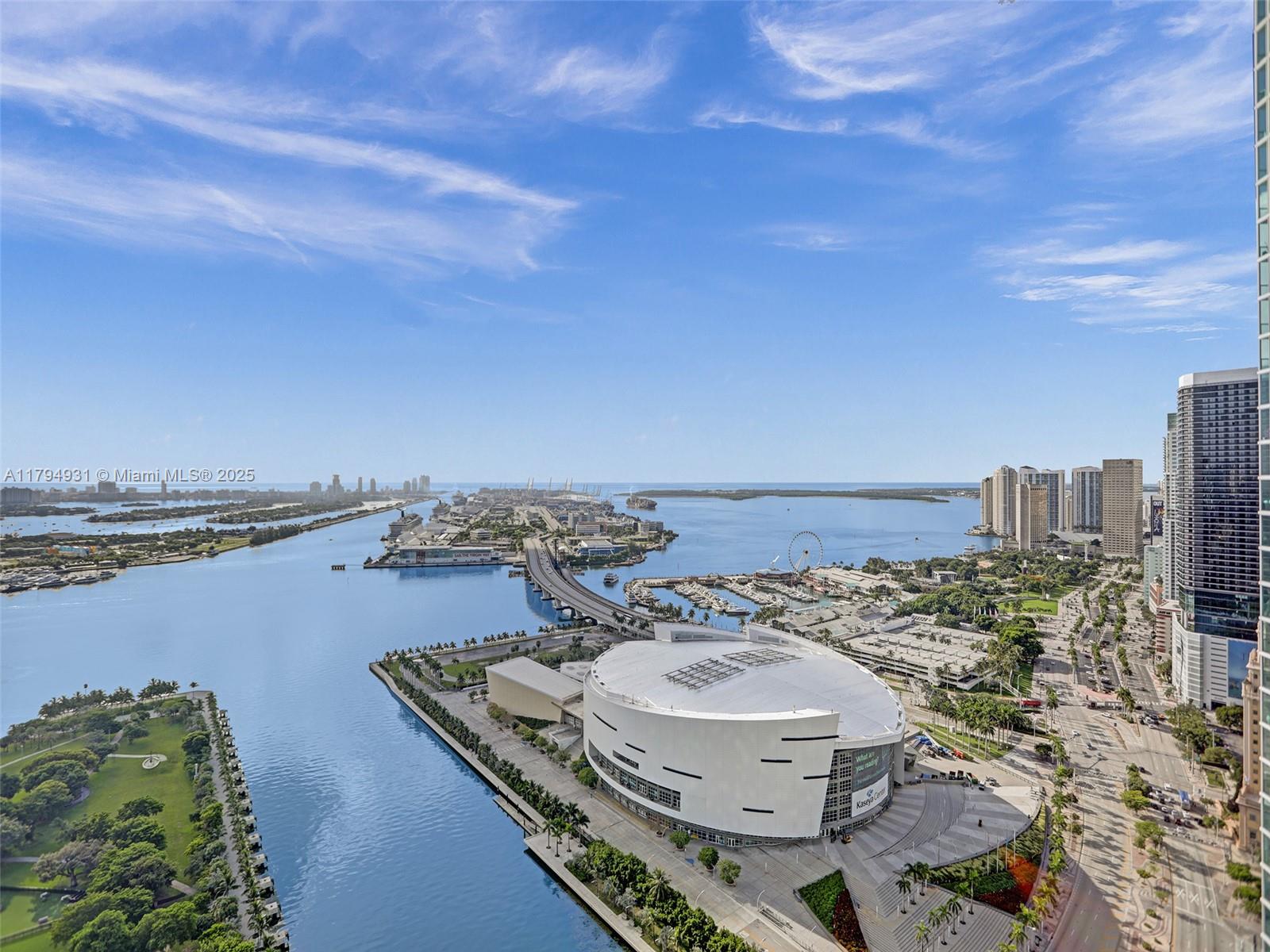 tep into luxury living at Unit 4103 in the prestigious 900 Biscayne Bay. This stunning 1-bedroom plus den, 2-bathroom residence offers breathtaking direct views of Biscayne Bay and the Atlantic Ocean from the 41st floor. Designed for comfort and style, the unit features elegant electric shades, floor-to-ceiling impact windows, and a spacious open layout flooded with natural light. The custom-built walk-in closet provides ample storage with a sleek, modern finish, while the gourmet kitchen boasts top-of-the-line appliances and contemporary cabinetry. Residents enjoy access to world-class amenities including two heated pools, a full-service spa, state-of-the-art fitness center, screening room, and 24/7 concierge and valet services, all in one of Downtown Miami’s most sought-after high-rises.