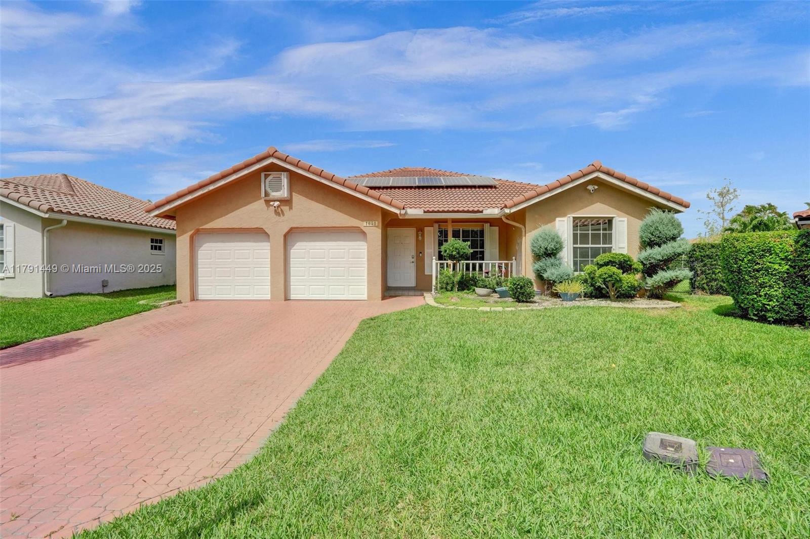 1651 NW 106th Way, Coral Springs, Florida image 2