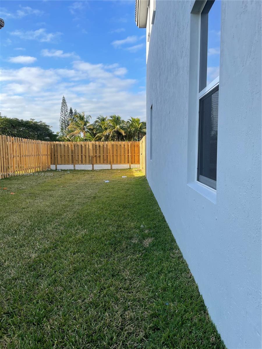 Beautiful townhome located in a corner lot, one bedroom and bathroom downstairs have been  updated to modern style, all windows have top of the line Zebra blinds. First floor with tile through out. Quartz countertops as well as stainless steel appliances. Patio have been upgraded to entertain with family and friends. This townhome is centrally located and close to Florida Turnpike. Seller is contributing to 5K toward closing cost.