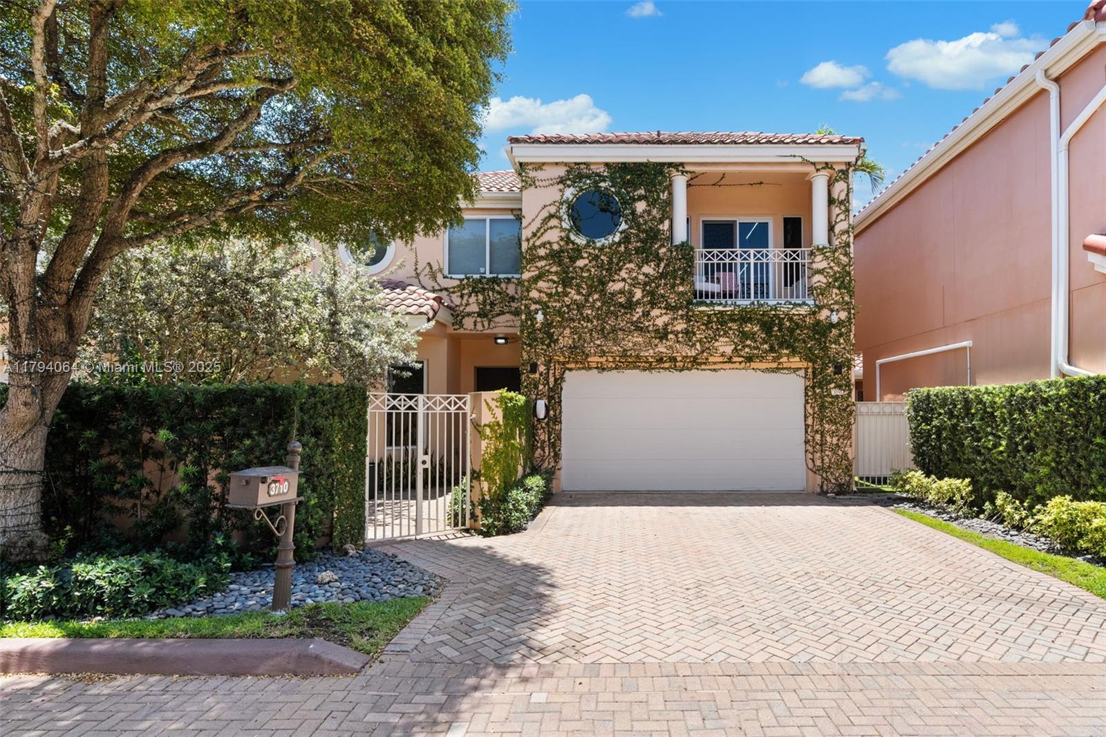 Welcome to this beautifully maintained 3-bedroom, 3-bathroom residence nestled in the exclusive gated community of "Island Way" in Aventura. This two-story home offers elegant living with a spacious floor plan, perfect for both relaxing and entertaining. Step into a bright and airy living room with soaring ceilings, a formal dining area, and a generous family room that opens directly to the outdoor oasis. The gourmet kitchen features ample storage and connects seamlessly to the main living areas. Upstairs, you’ll find well-appointed bedrooms. Private backyard complete with a pool. Additional highlights include a two-car attached garage.