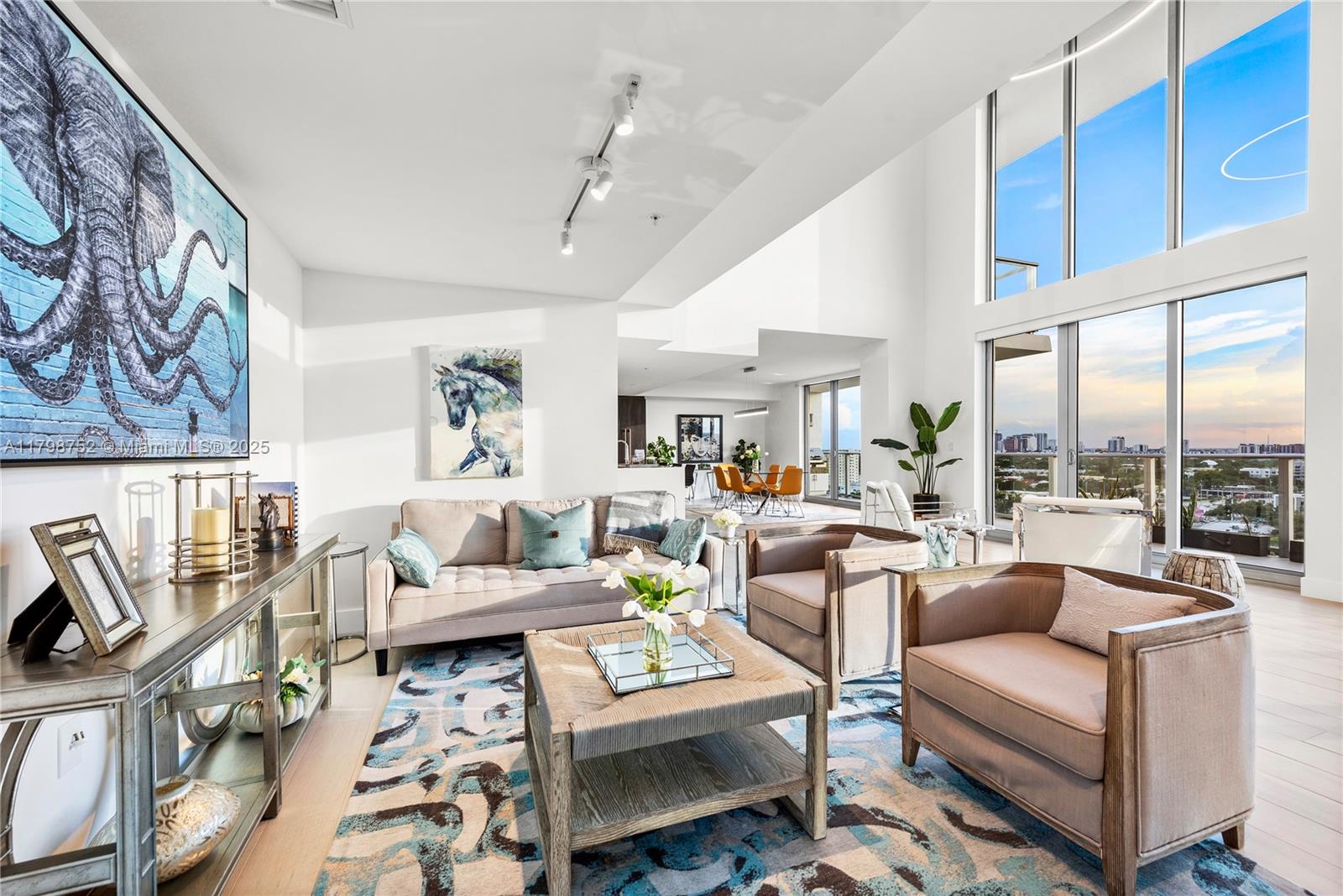 Incredible Investment Opportunity at RIVA! Rented at $13,500/Month until Fall 2026—a Roughly $200K Value in Future Income. Priced at Just $813/SqFt, By Far the Lowest for a 3 Bedroom in RIVA. This Furnished 2-Story Penthouse Loft Features 20’ Windows for Dramatic Sunsets & Skyline Views, Chef’s Kitchen with Sub-Zero, Wolf Gas Cooktop, Wine Cooler, Italian Cabinetry & 3 Balconies with BBQ. Spacious Primary Suite with Huge Walk-In, 2 Bedrooms + Office Upstairs, Electric Blinds Throughout, Laundry Room with Utility Sink & Storage, 2 Parking Spots & Storage Included. RIVA’s 40,000 SqFt of Resort Quality Amenities: Heated Lap Pool, Massive Gym, Yoga Studio, His & Her Spa, Hot Tub, 2-Story Lounge, Cucina, 3 Guest Suites, Valet, 2 Dog Walks, Central Location & More. One of Only 2 Lofts in RIVA.