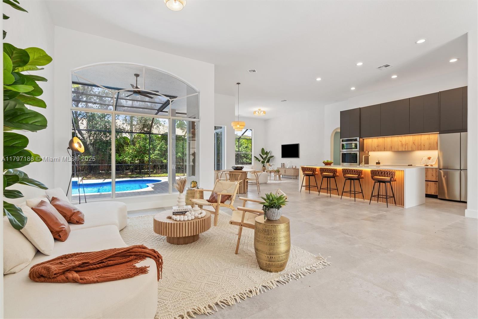 Modern and elegant home featuring beautiful open-concept living spaces filled with natural light. Enjoy high ceilings, a spacious master suite with double showers and a freestanding tub, and a private backyard with a stunning pool. brand new roof 2025. Located in a peaceful and welcoming community offering tennis courts, a playground, and serene surroundings—perfect for families or anyone seeking comfort and tranquility.