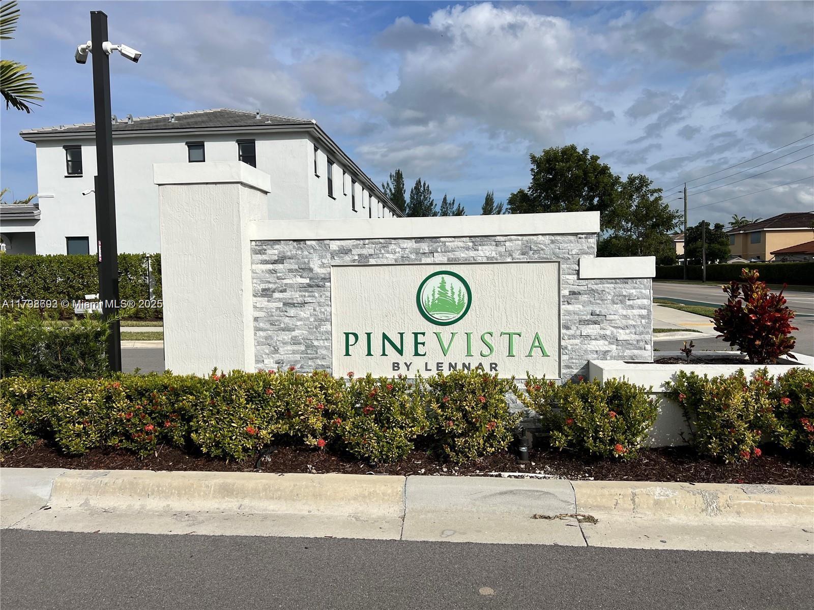 Corner lot unit  with 3 assigned parking spaces located in the new development of Pine Vista.This  townhouse Features 3 bedrooms, 2 1/2 bathrooms, Conveniently located near the Turnpike Walmart. Pharmacies, shops / restaurants,The new Amazon Warehouse Center, Homestead Air Reserve Base, And the Florida Keys. This property is located in a gated community and features new stainless steel appliances, a washer dryer. Tile floors on the first floor is tilew through out And carpet on the second floor. Patio is fenced. Perfect for a Barbecue area with grass. Tankless water heater.