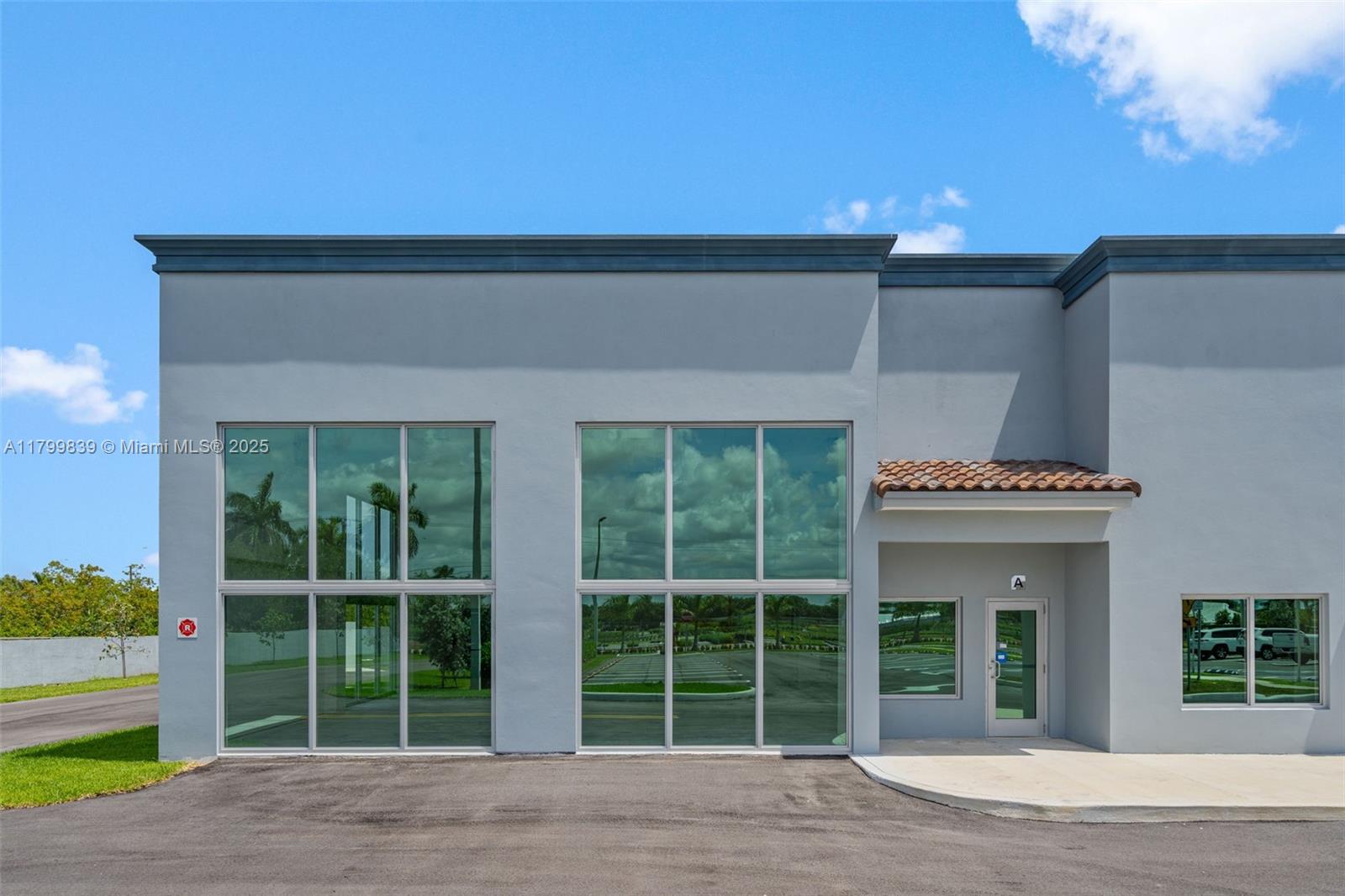 This stunning brand-new commercial space for lease is a corner unit that presents endless possibilities for your business. Conveniently located near Krome Ave in Homestead, provides easy access for customers. The 2,001 SF space boasts large windows providing ample natural light, creating an inviting atmosphere for employees and visitors. The high 16-foot ceiling adds a sense of grandeur to the space, making it perfect for a retail store, office, medical facility, or restaurant. This versatile space offers 48 public parking spaces, one restroom inside Unit A, central AC, and independent meters for electricity and water. Don't miss this opportunity to elevate your business to new heights. There is no other space like this one in the area. Schedule a viewing today!